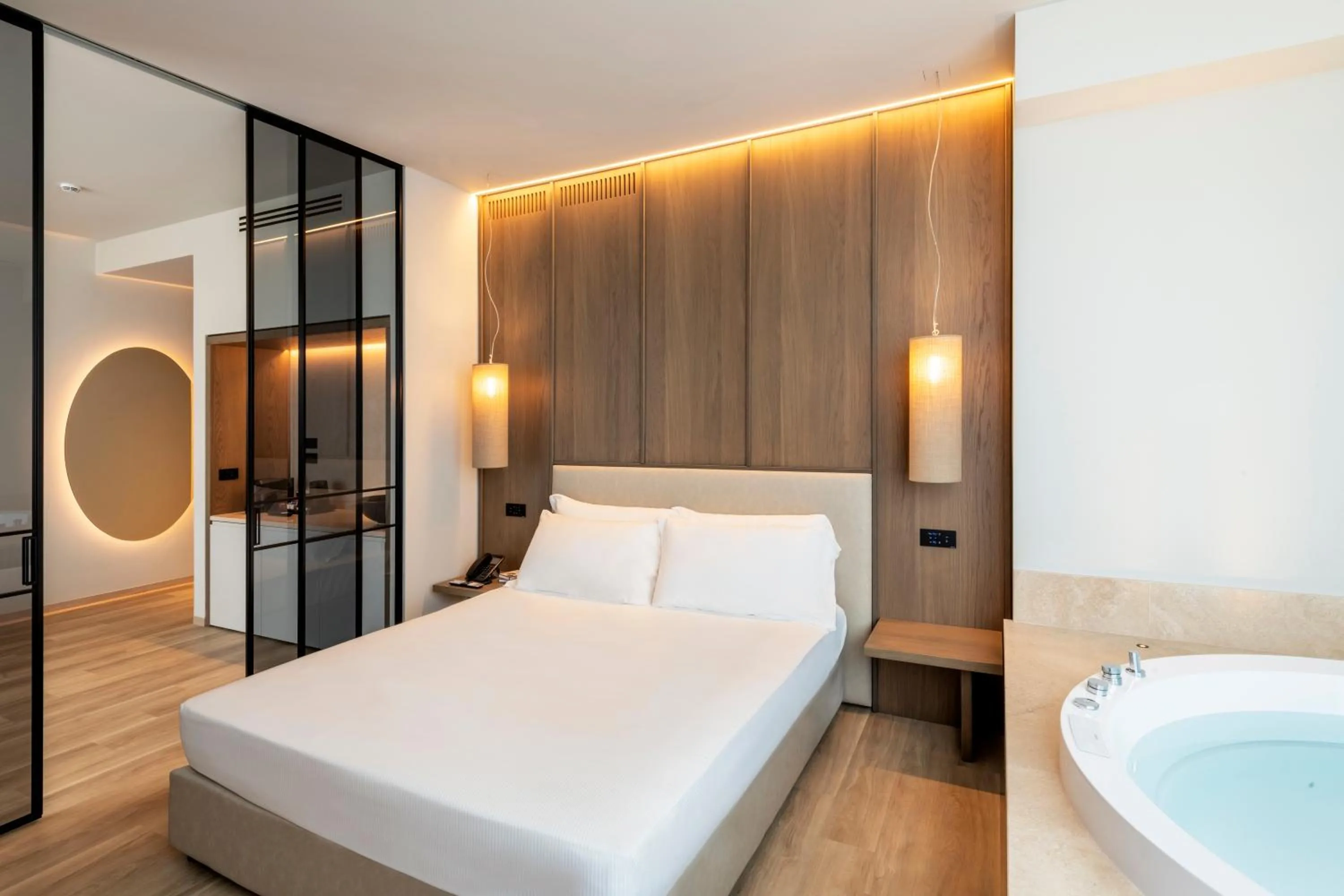 Bed in International Hotel & Suite