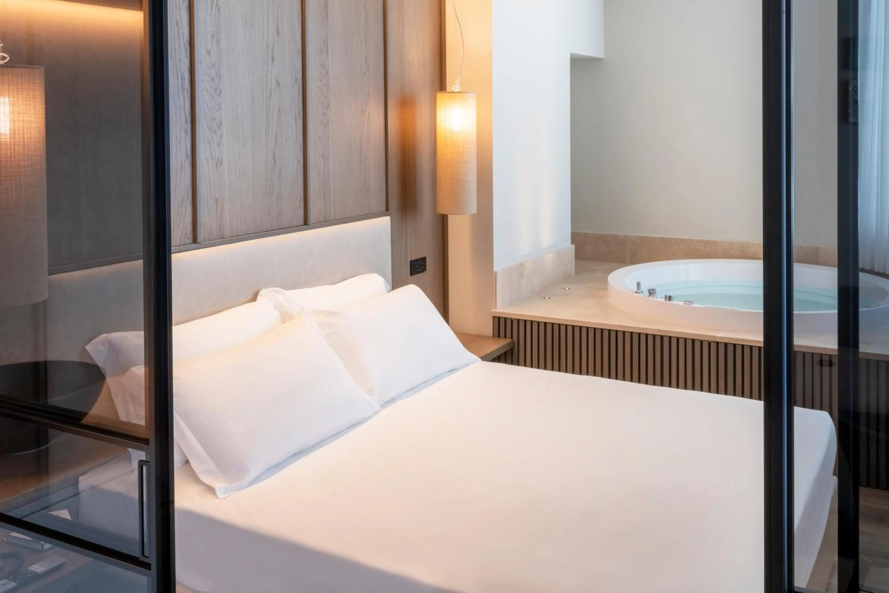Bed in International Hotel & Suite