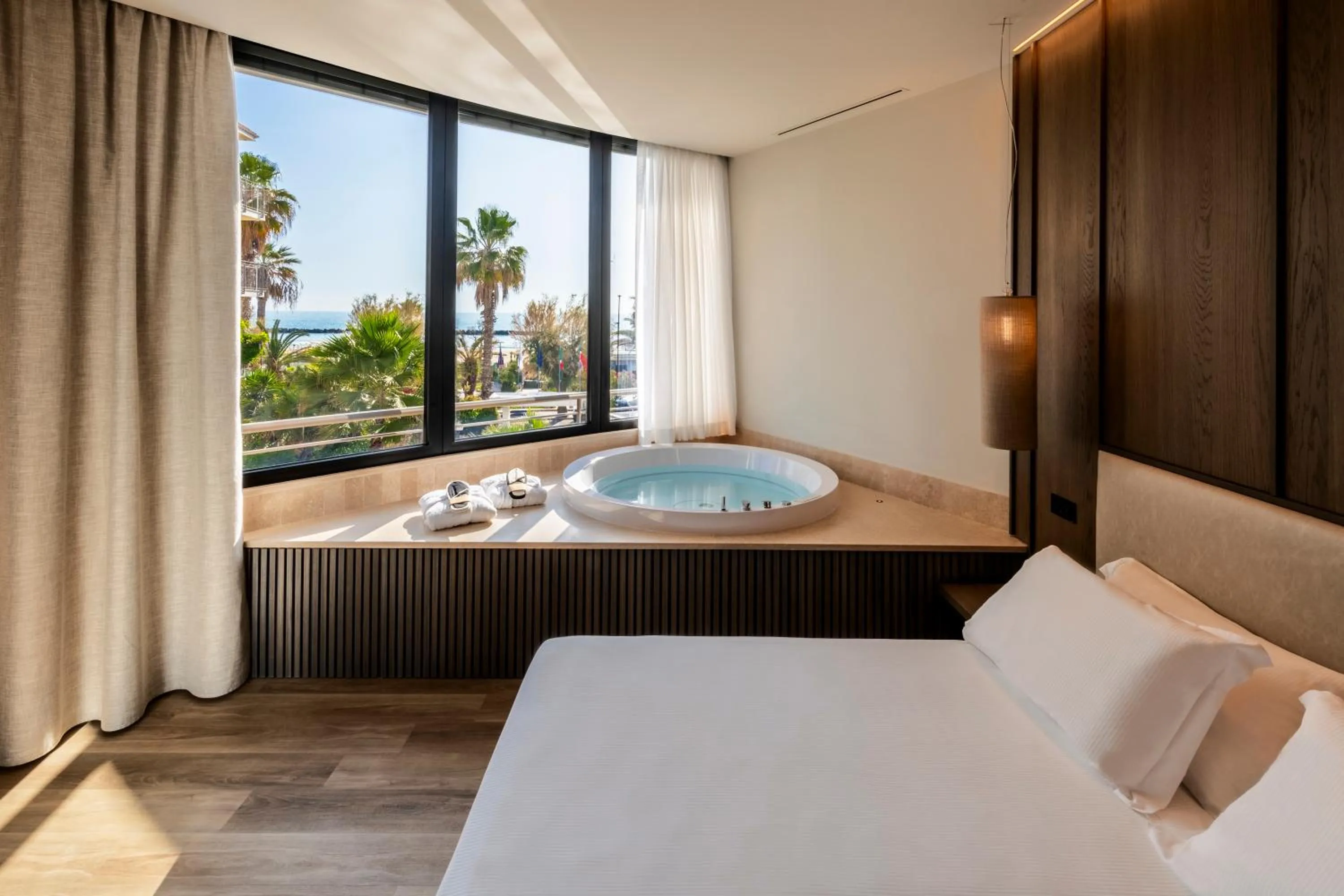 Bed in International Hotel & Suite