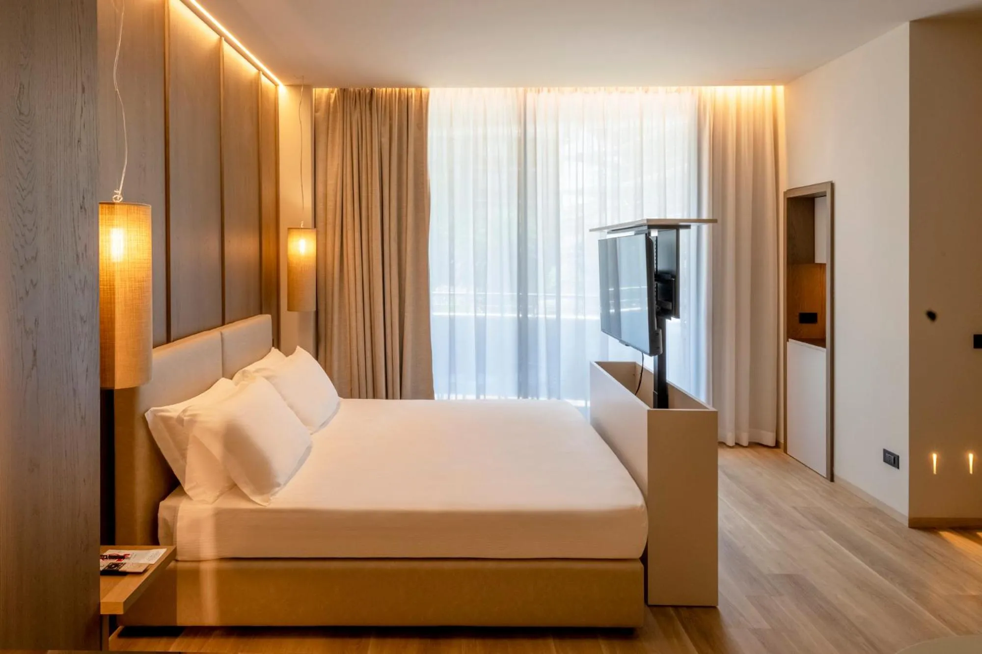 Bed in International Hotel & Suite