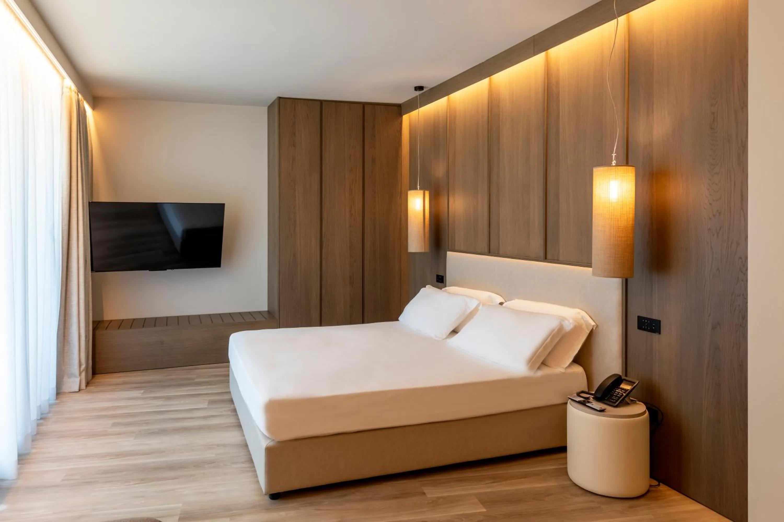 Bed in International Hotel & Suite