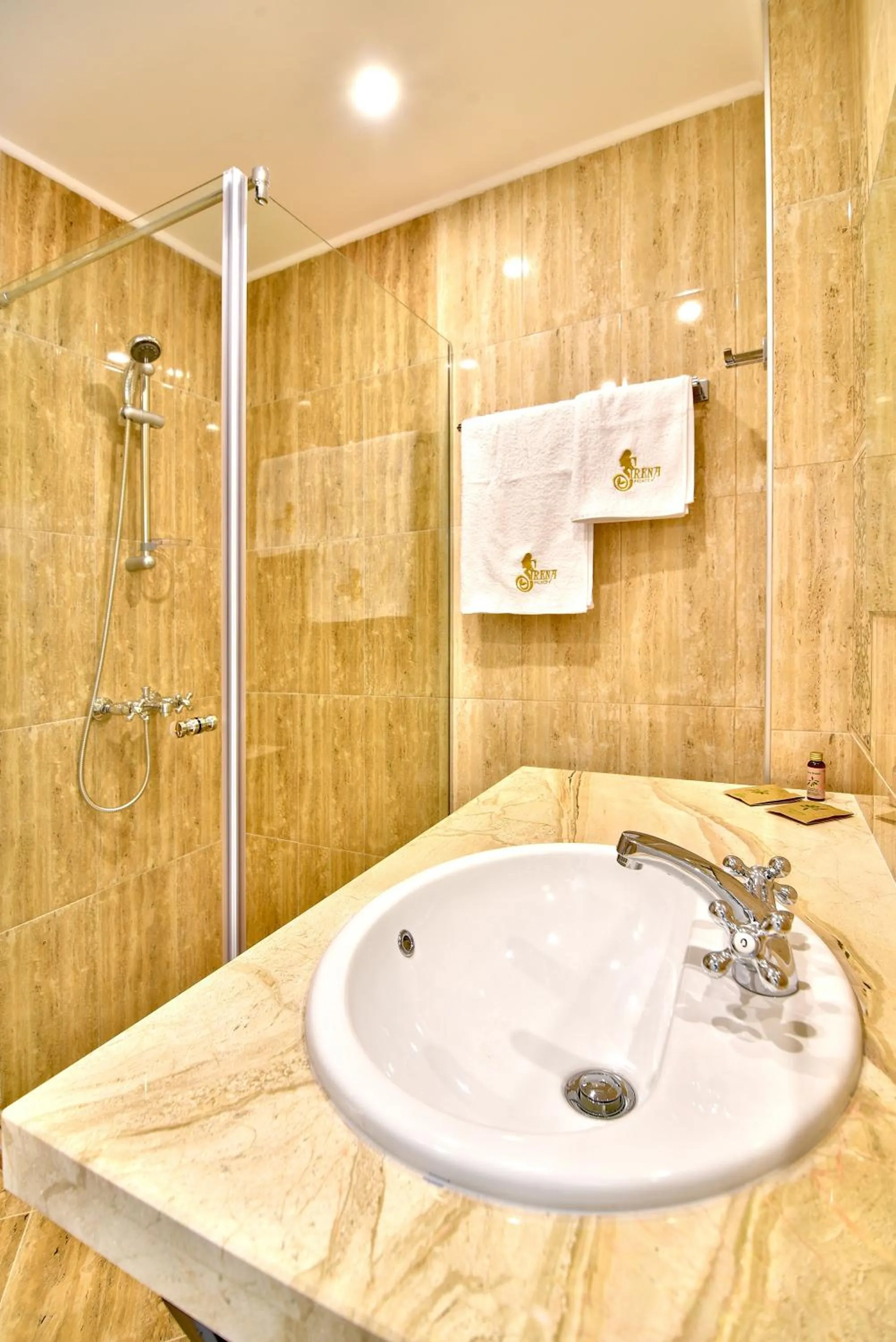 Shower in Sirena Palace Family Hotel