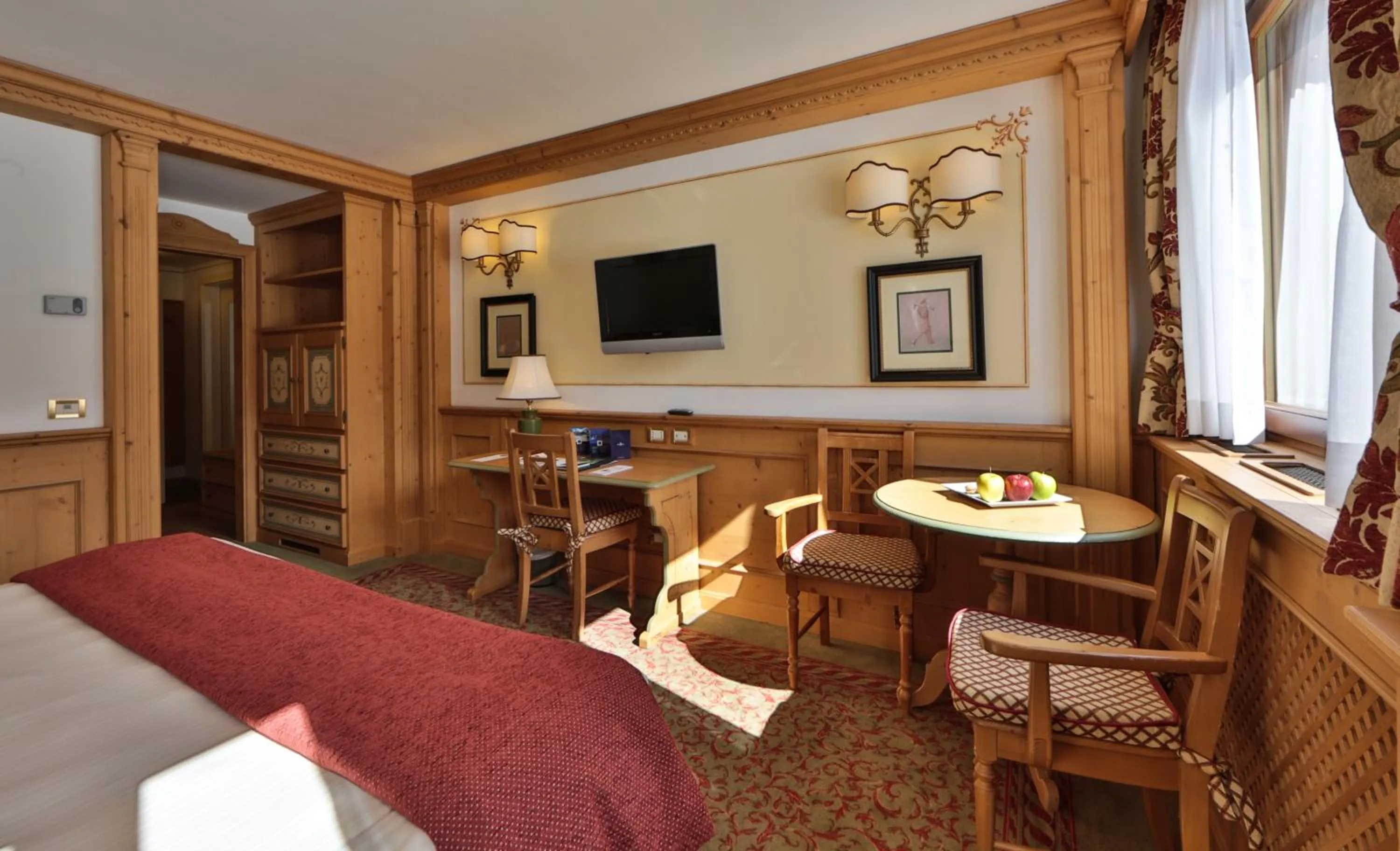 Photo of the whole room in TH Madonna di Campiglio | Golf Hotel