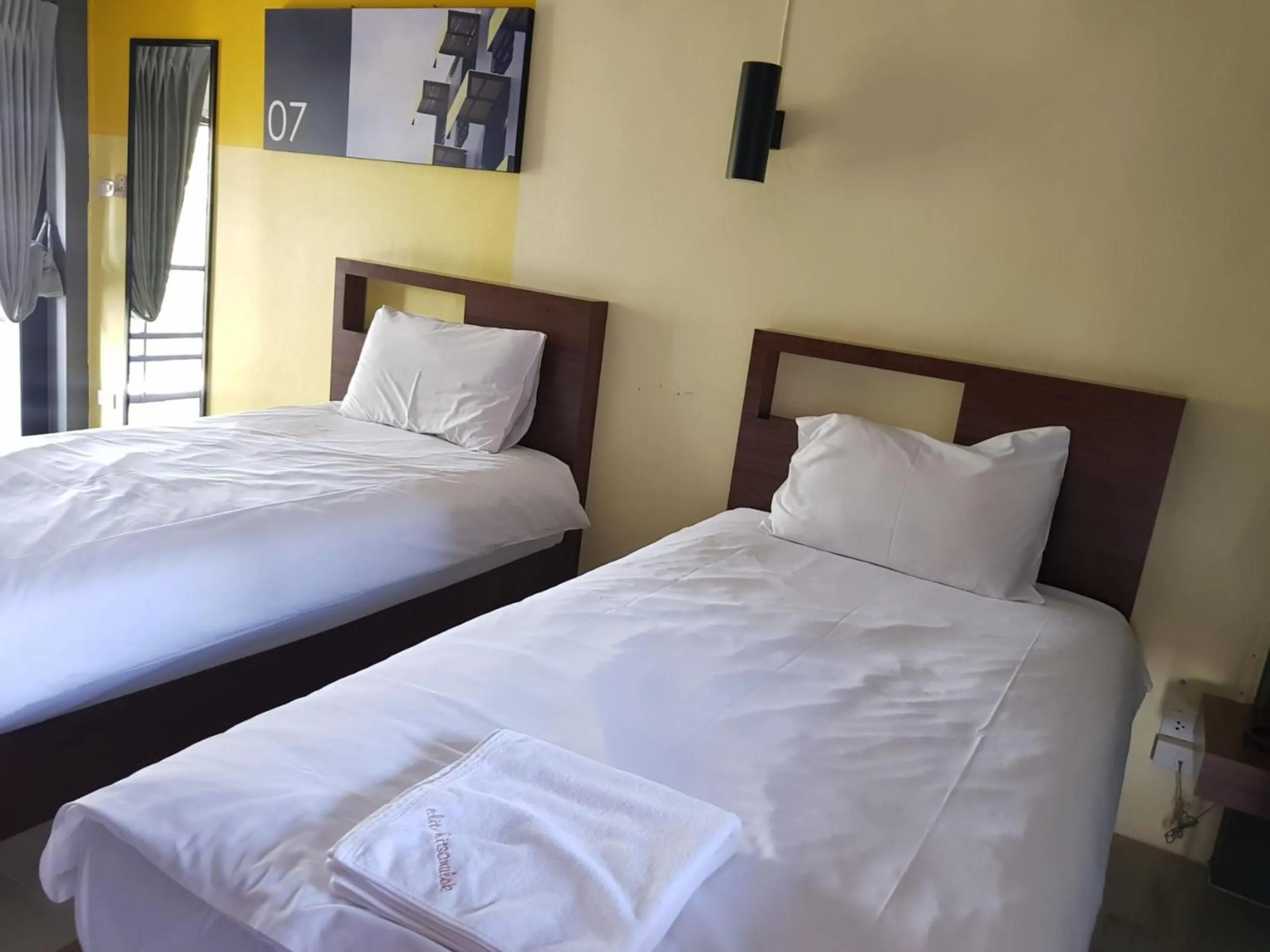 Photo of the whole room, Bed in Elite Residence Phitsanulok SHA