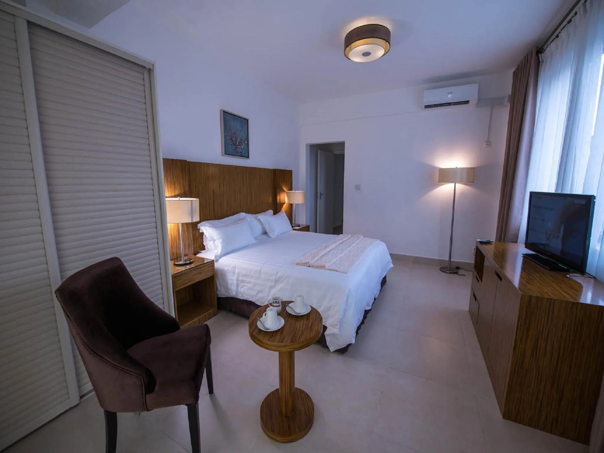 Bedroom in Palms Hotel