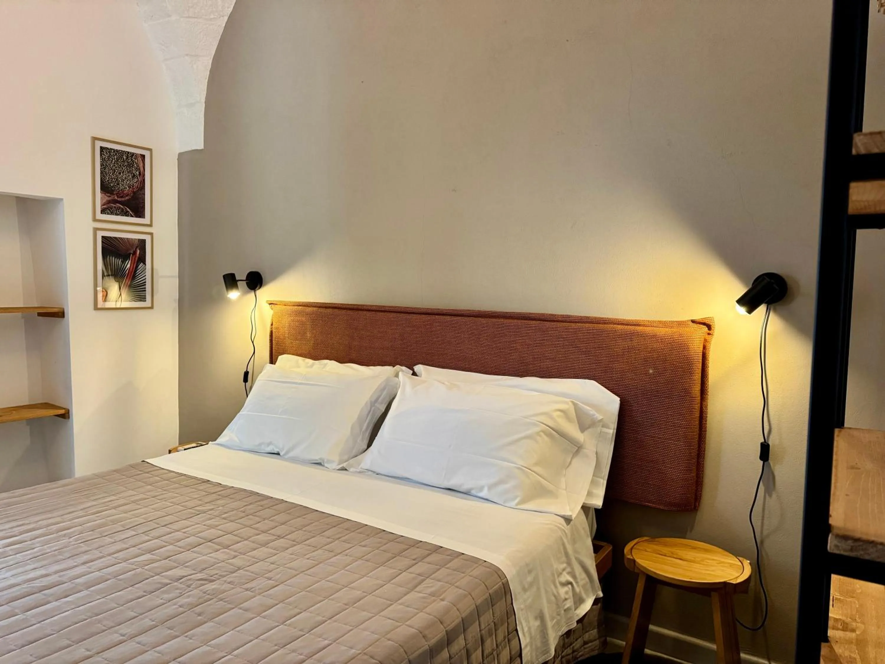 Bed in Tenuta Amostuni-Country House