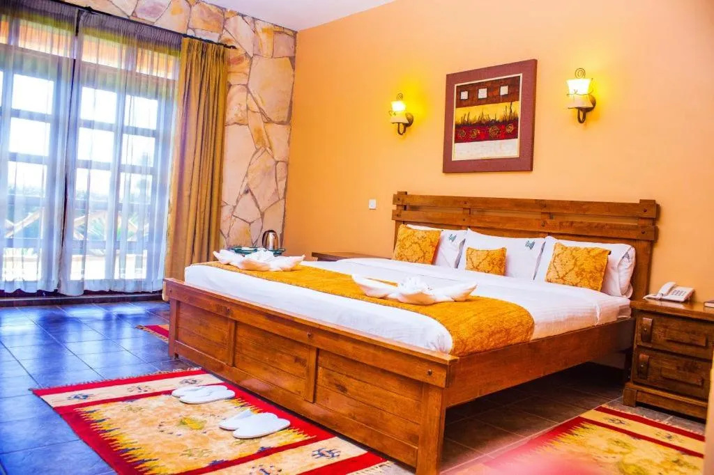 Bed in Mountains of the Moon Hotel Fort Portal