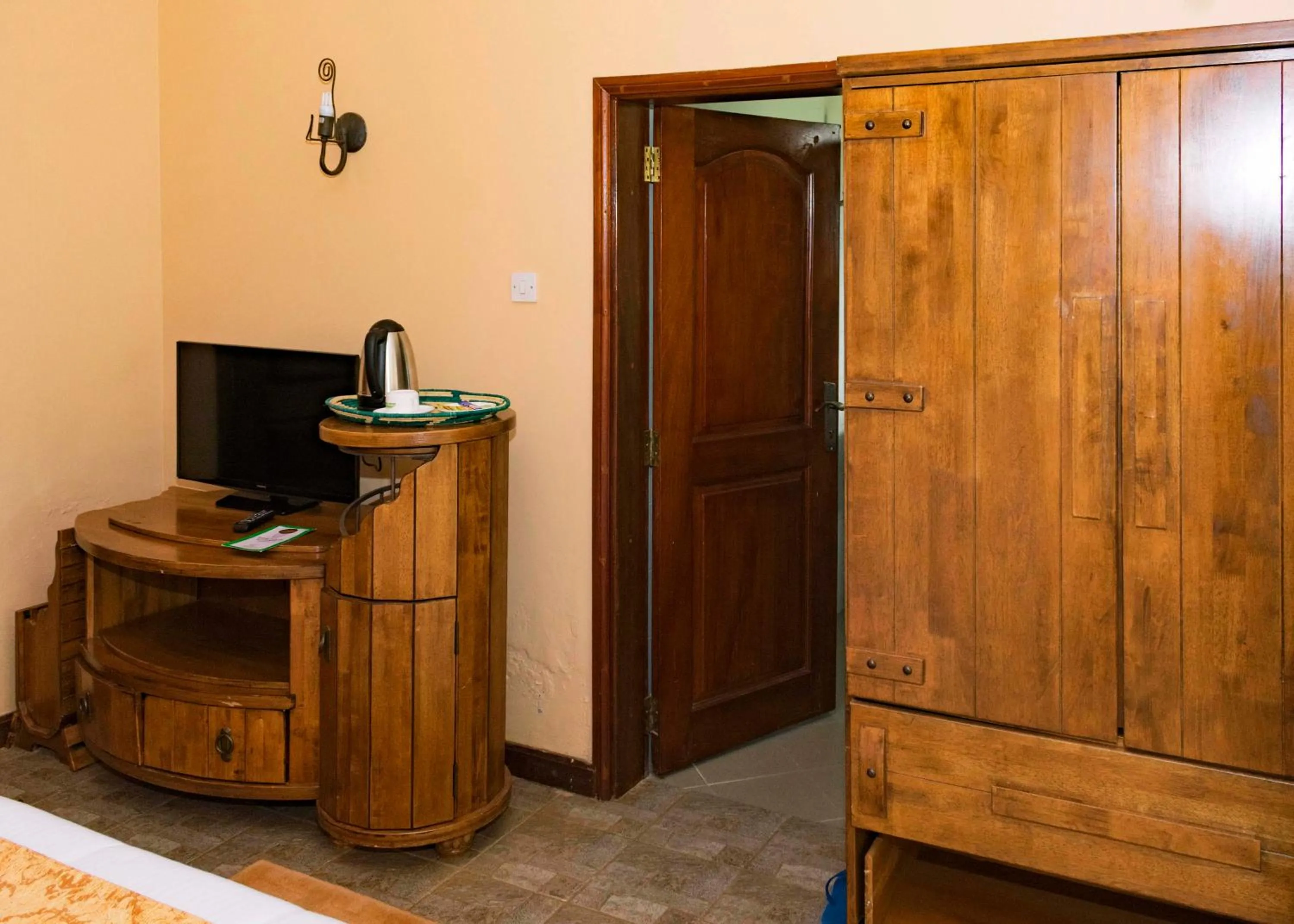 Communal lounge/ TV room in Mountains of the Moon Hotel Fort Portal