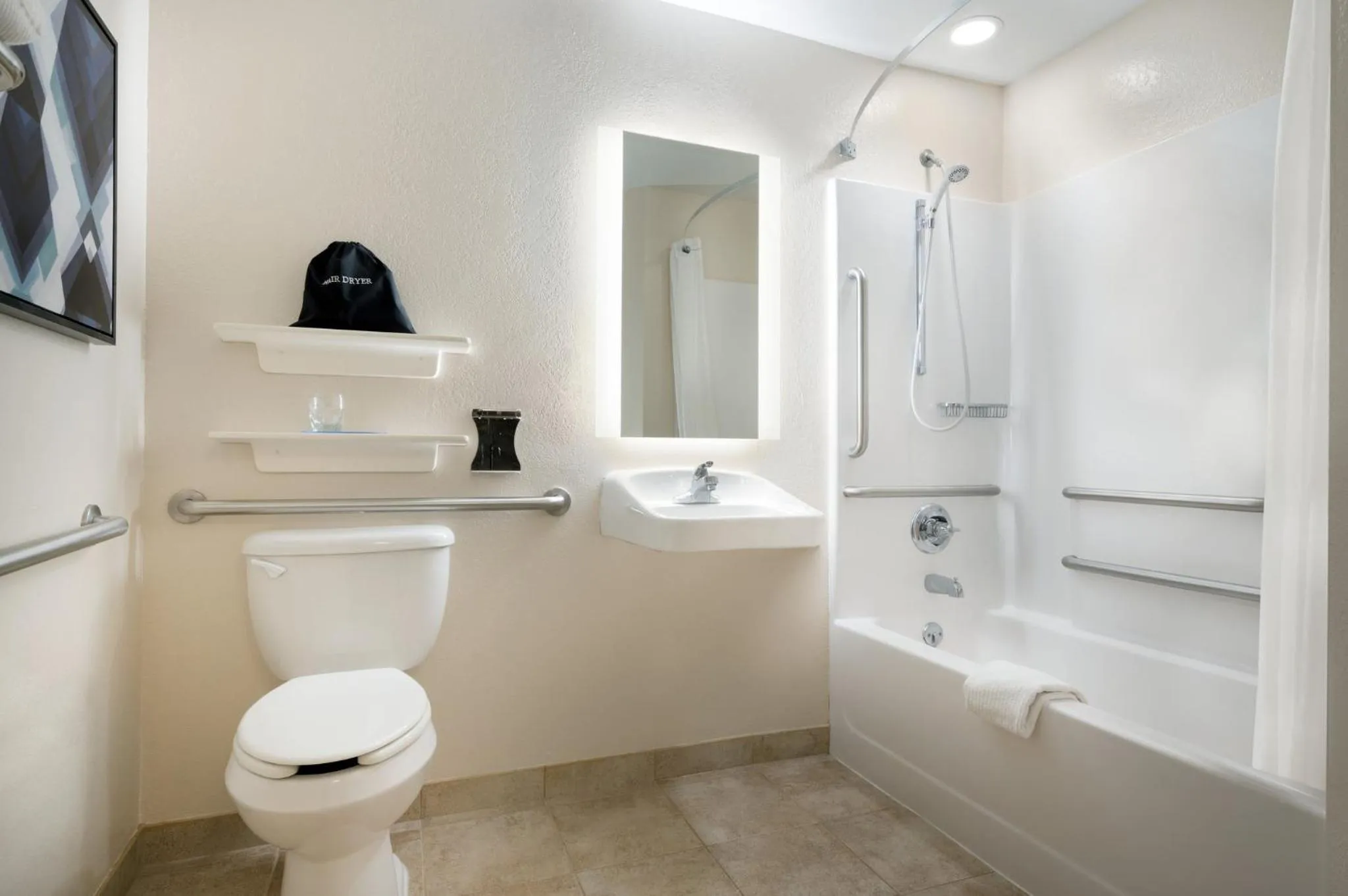 Bathroom in Candlewood Suites Watertown Fort Drum by IHG
