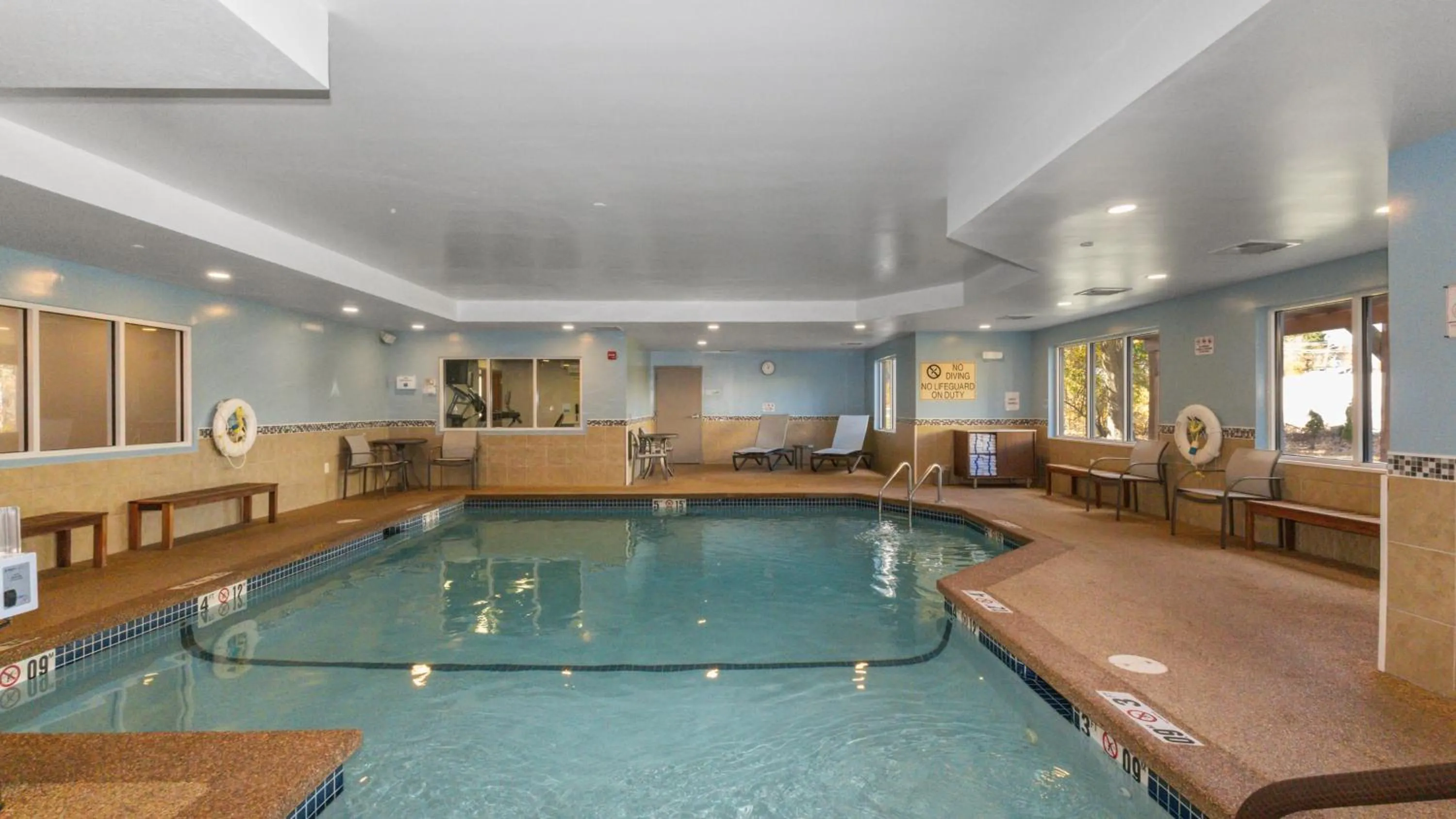 Swimming pool in Holiday Inn Express Hotel & Suites Hampton South-Seabrook by IHG