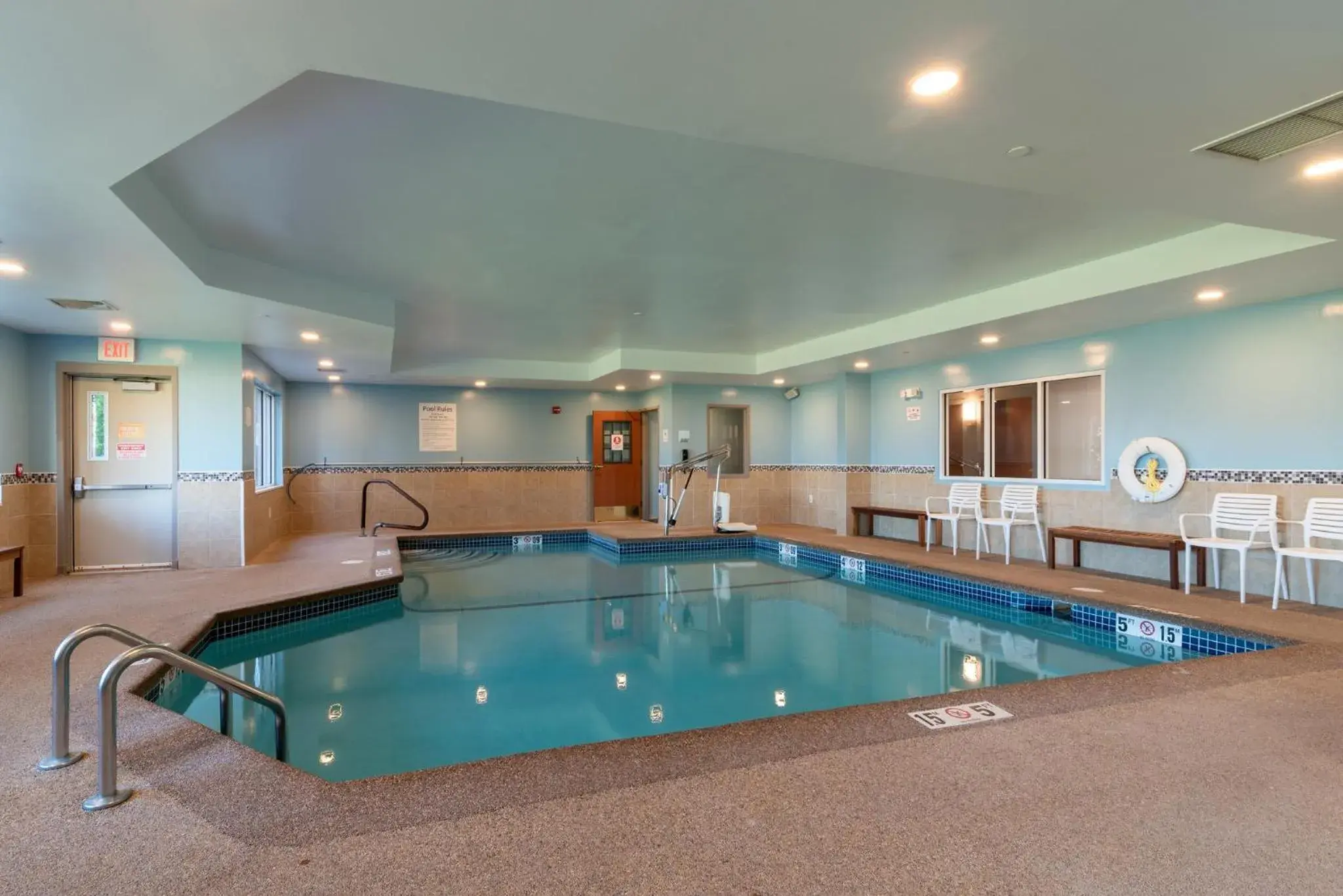 Swimming pool in Holiday Inn Express Hotel & Suites Hampton South-Seabrook by IHG Swimming pool in Holiday Inn Express Hotel & Suites Hampton South-Seabrook by IHG