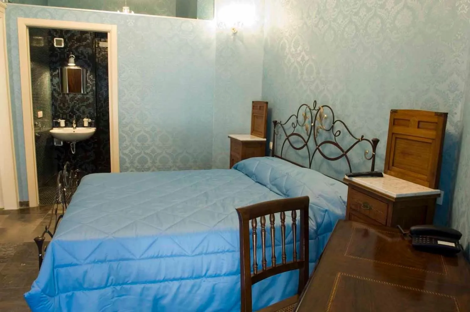 Bed in Grana Barocco Art Hotel