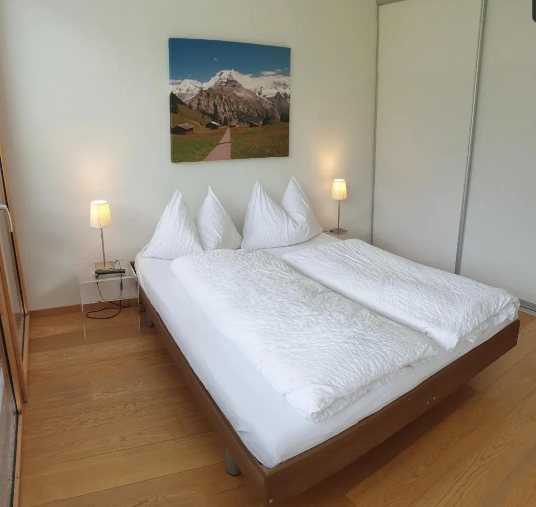 Bed in Hotel Jungfrau Mürren