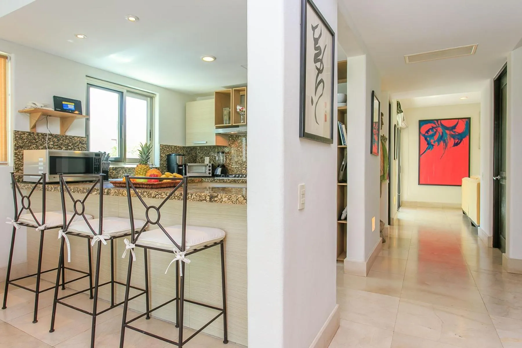 Kitchen or kitchenette in 3-Level Condo with a Private Balcony & Rooftop Lounge