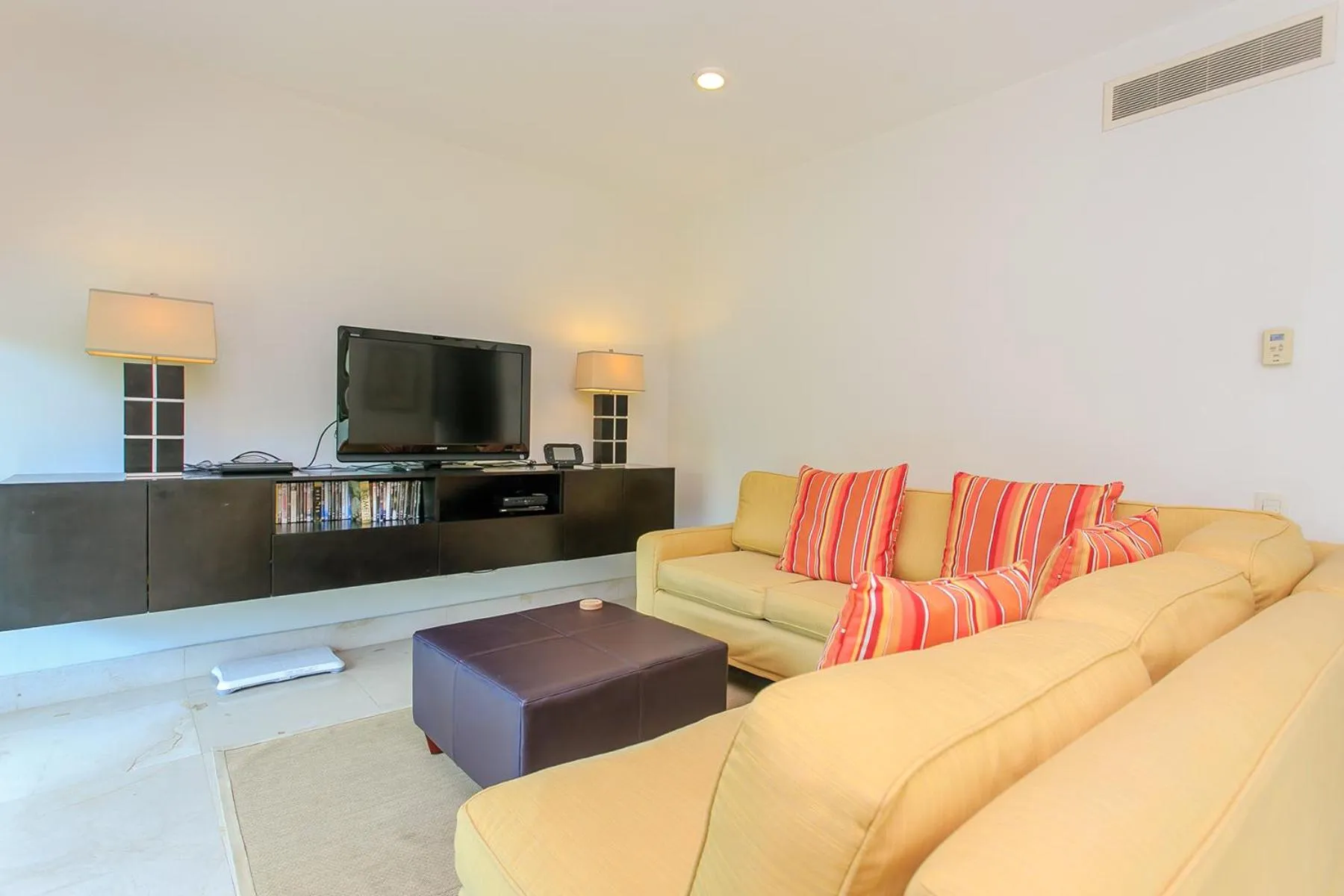 Living room in 3-Level Condo with a Private Balcony & Rooftop Lounge