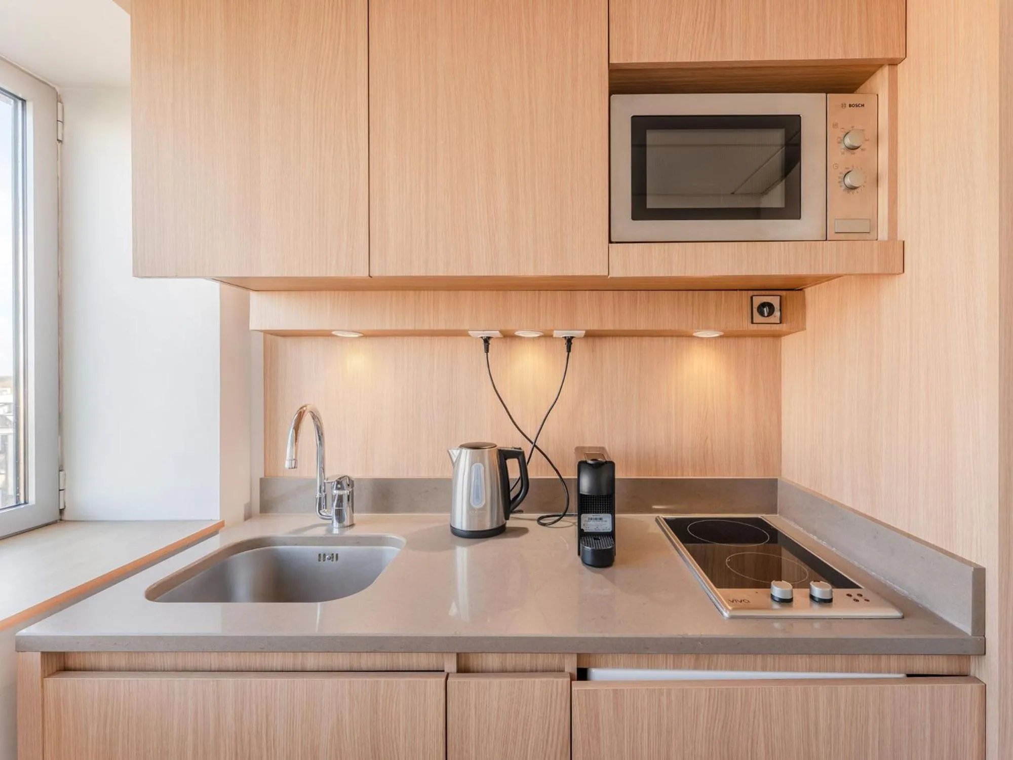 Kitchen or kitchenette in Residhome Nantes Berges De La Loire
