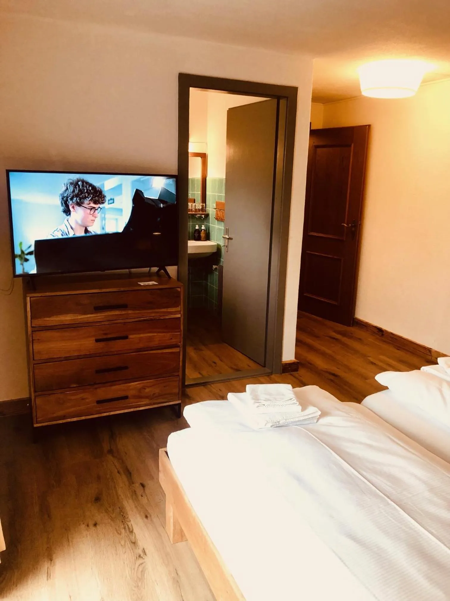 Bed in Hotel Christiania Saas-Fee