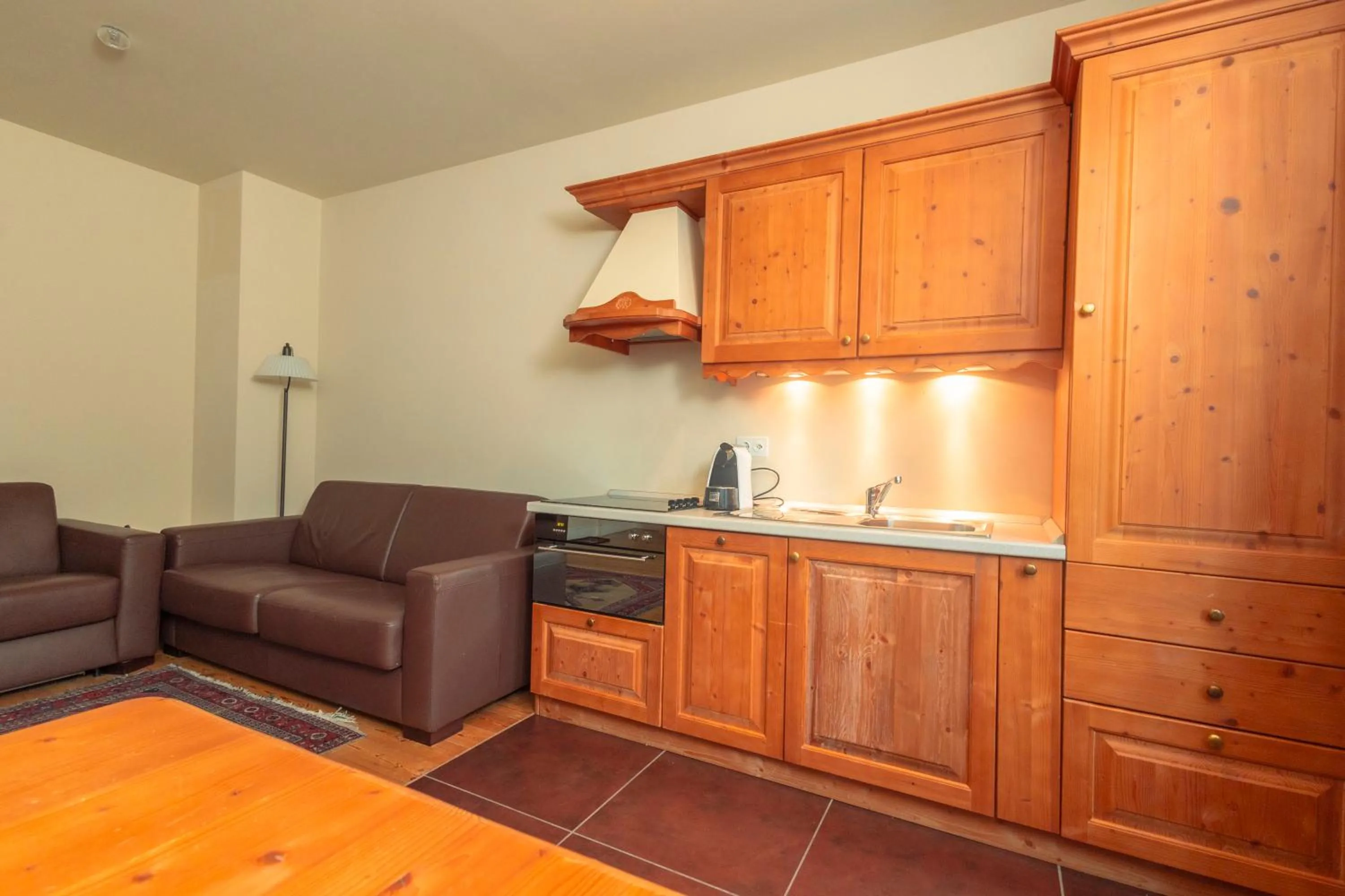 Kitchen or kitchenette in Hotel Bernina 1865 by Kleos Group Collection