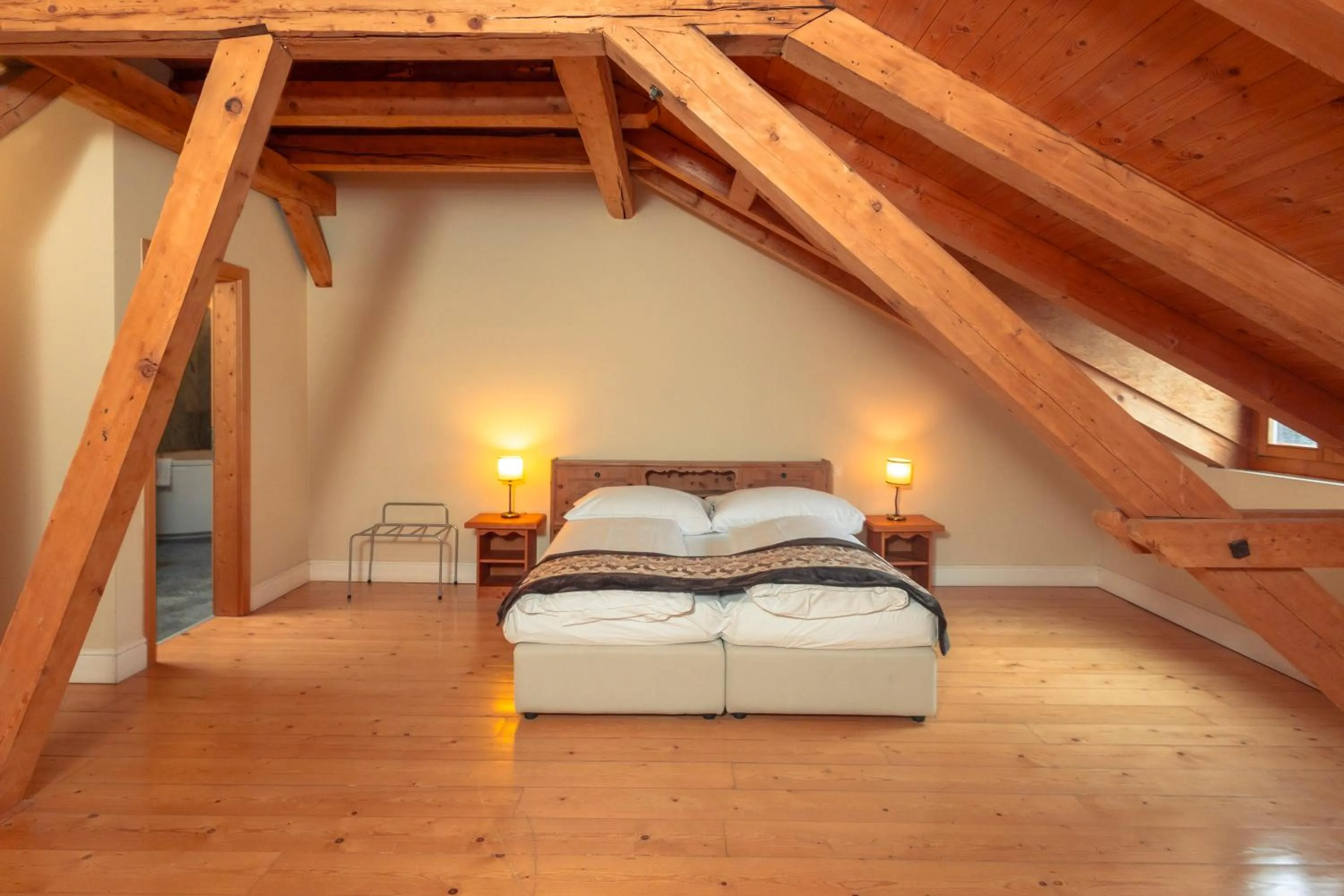 Bed in Hotel Bernina 1865 by Kleos Group Collection