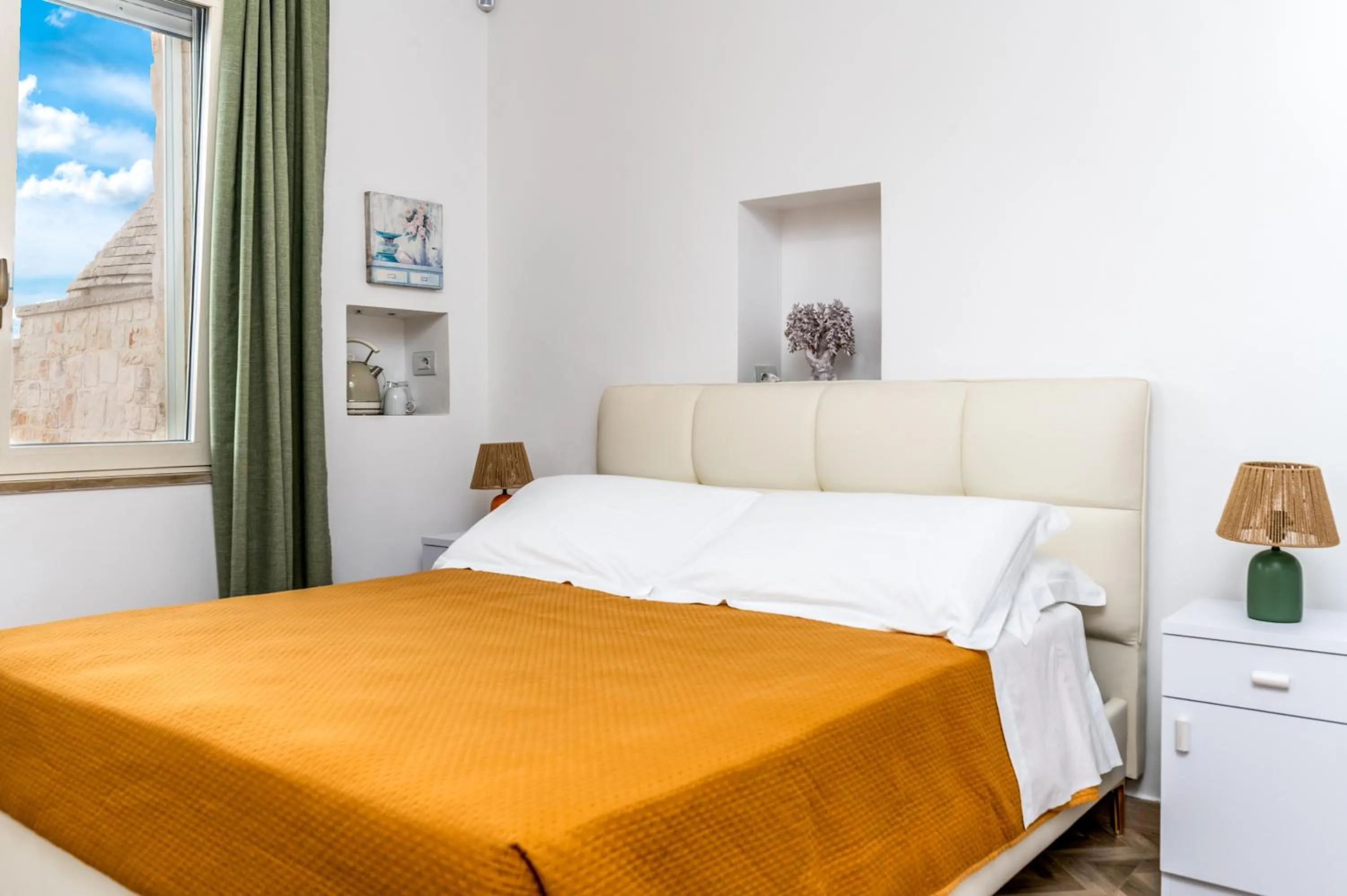 Bed in La Terrazza Sulla Rupe Relais