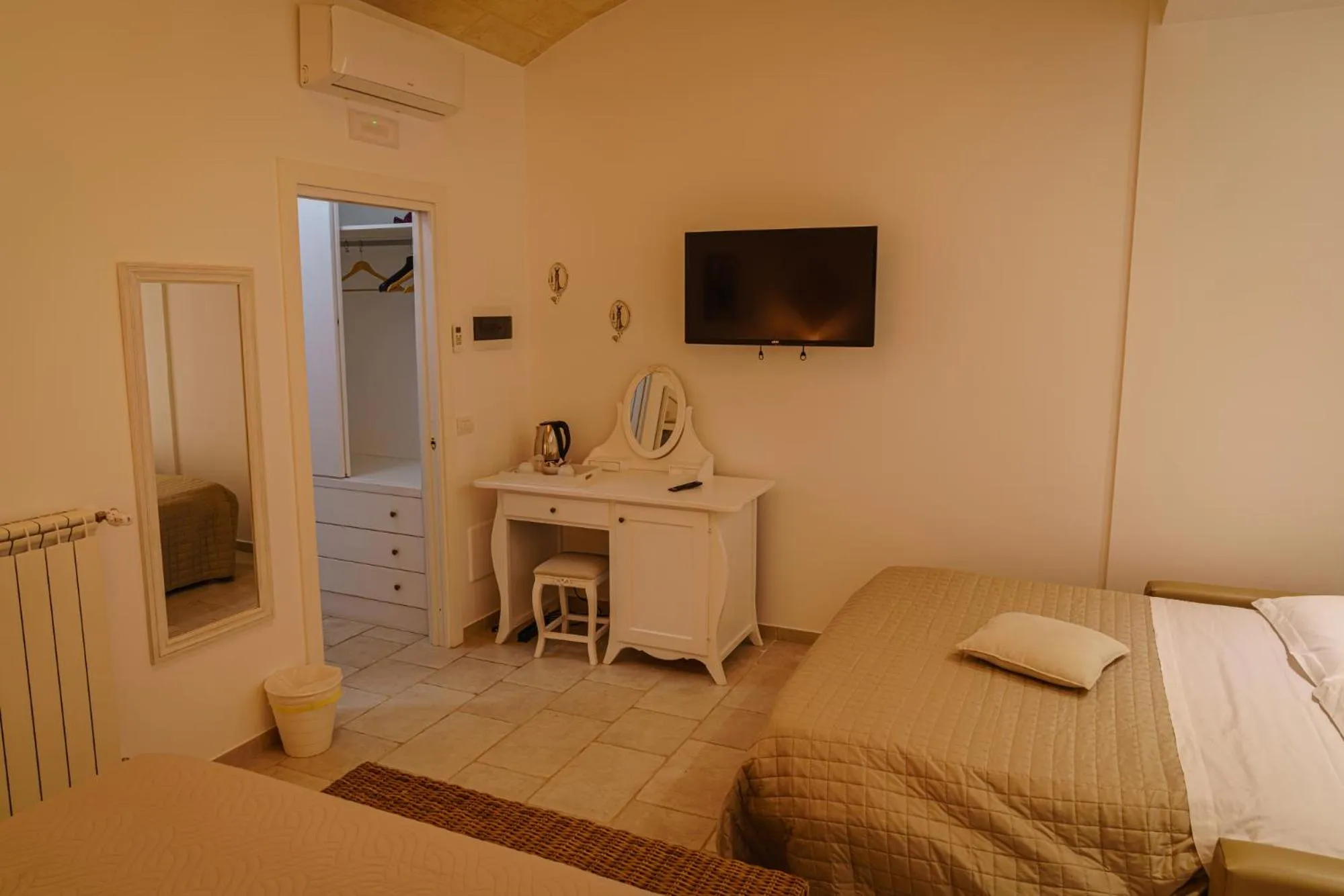 Bed in La Terrazza Sulla Rupe Relais