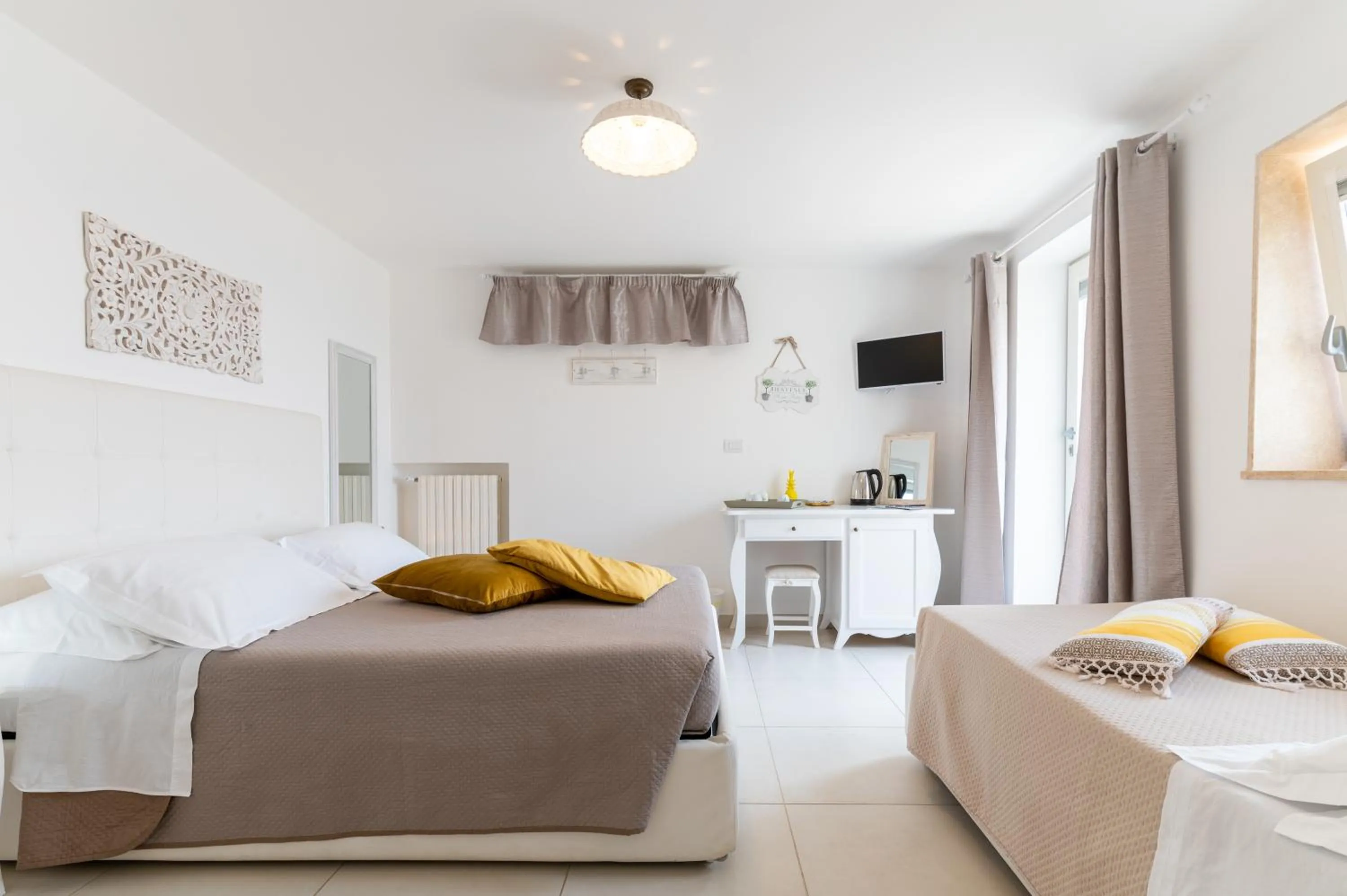 Bed in La Terrazza Sulla Rupe Relais