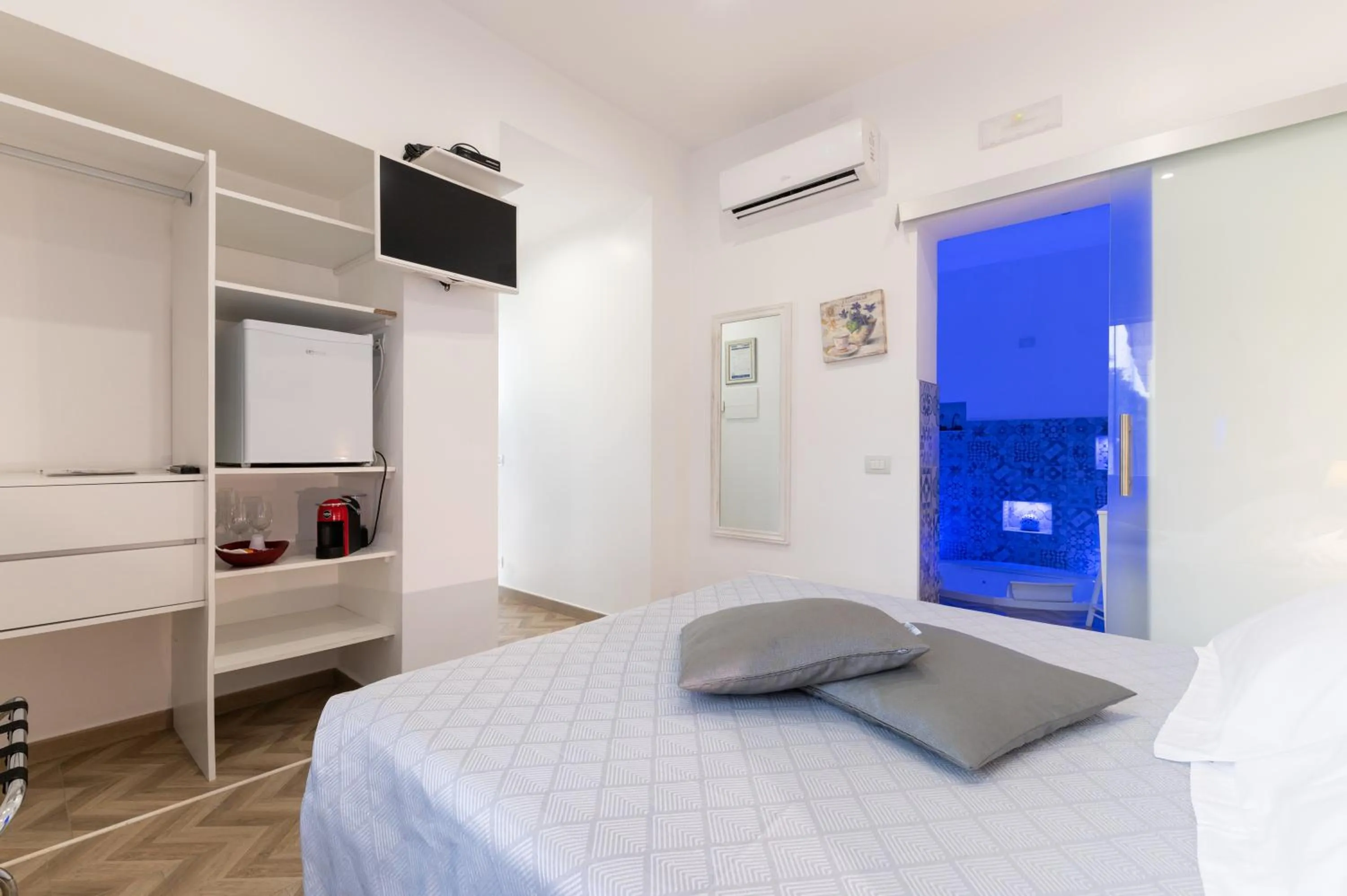 Bed in La Terrazza Sulla Rupe Relais