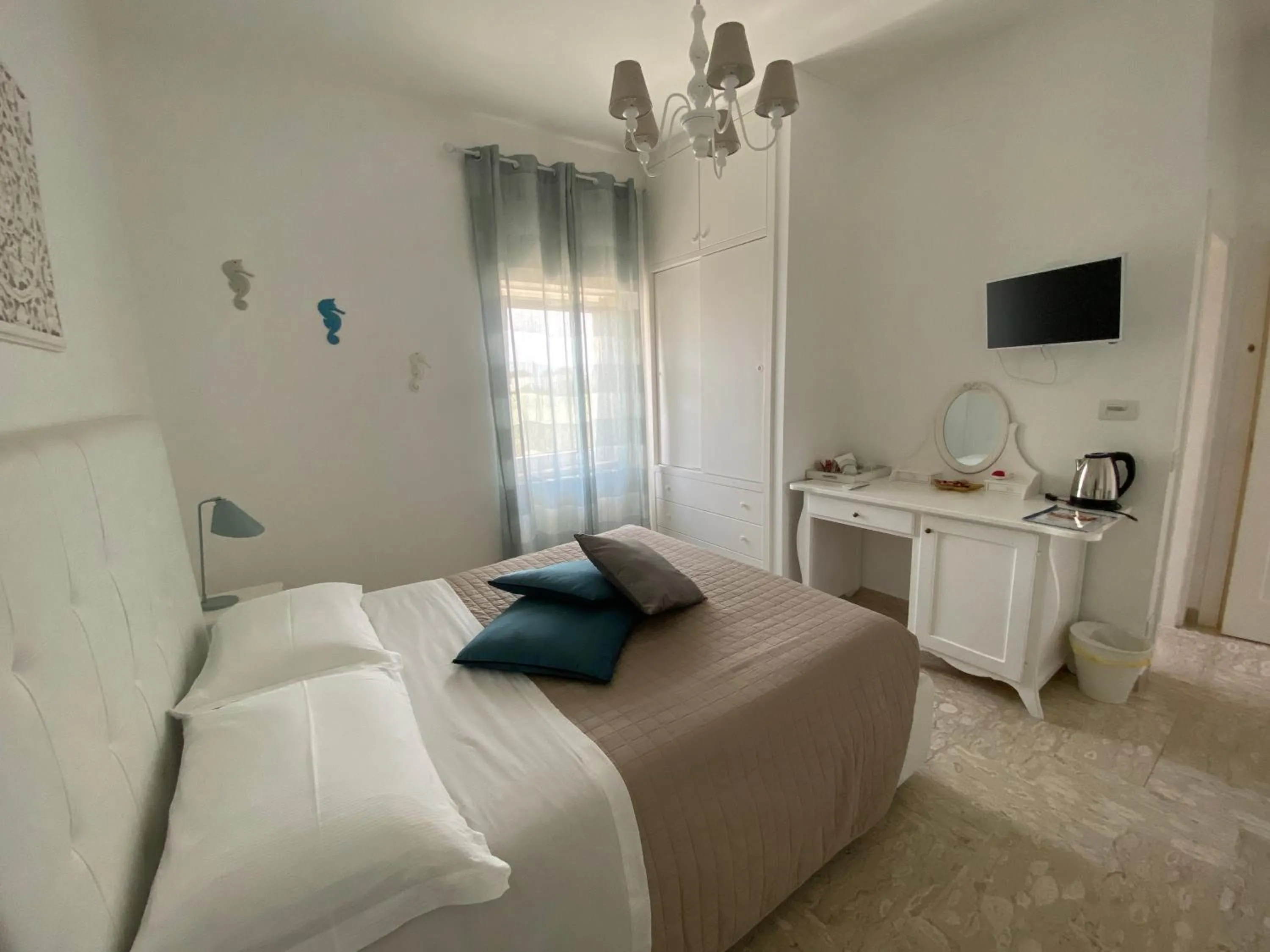 Bed in La Terrazza Sulla Rupe Relais