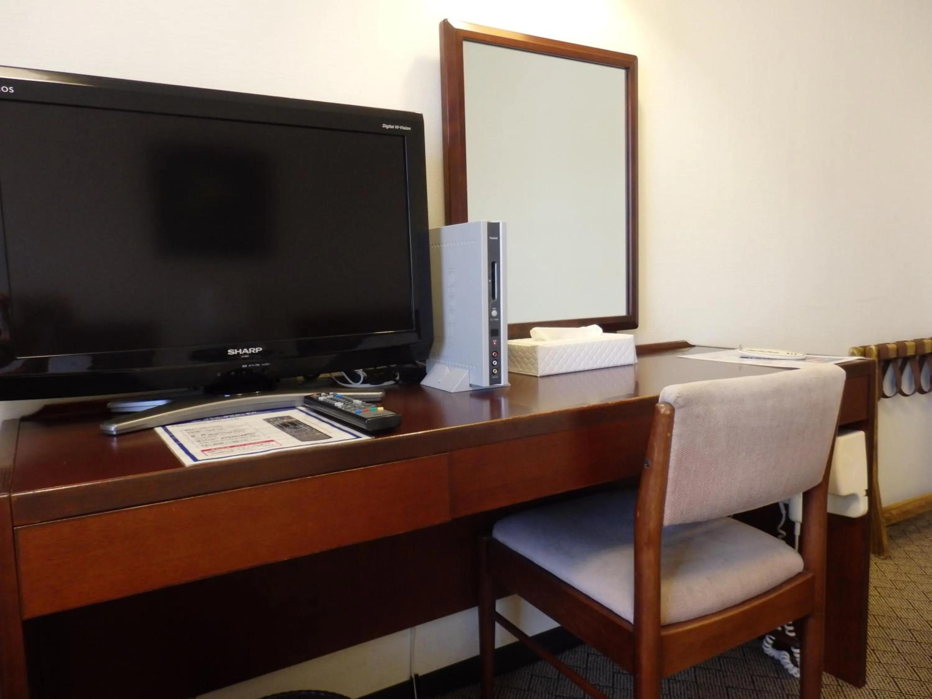 TV and multimedia, TV/Entertainment Center in Hotel New Tanaka