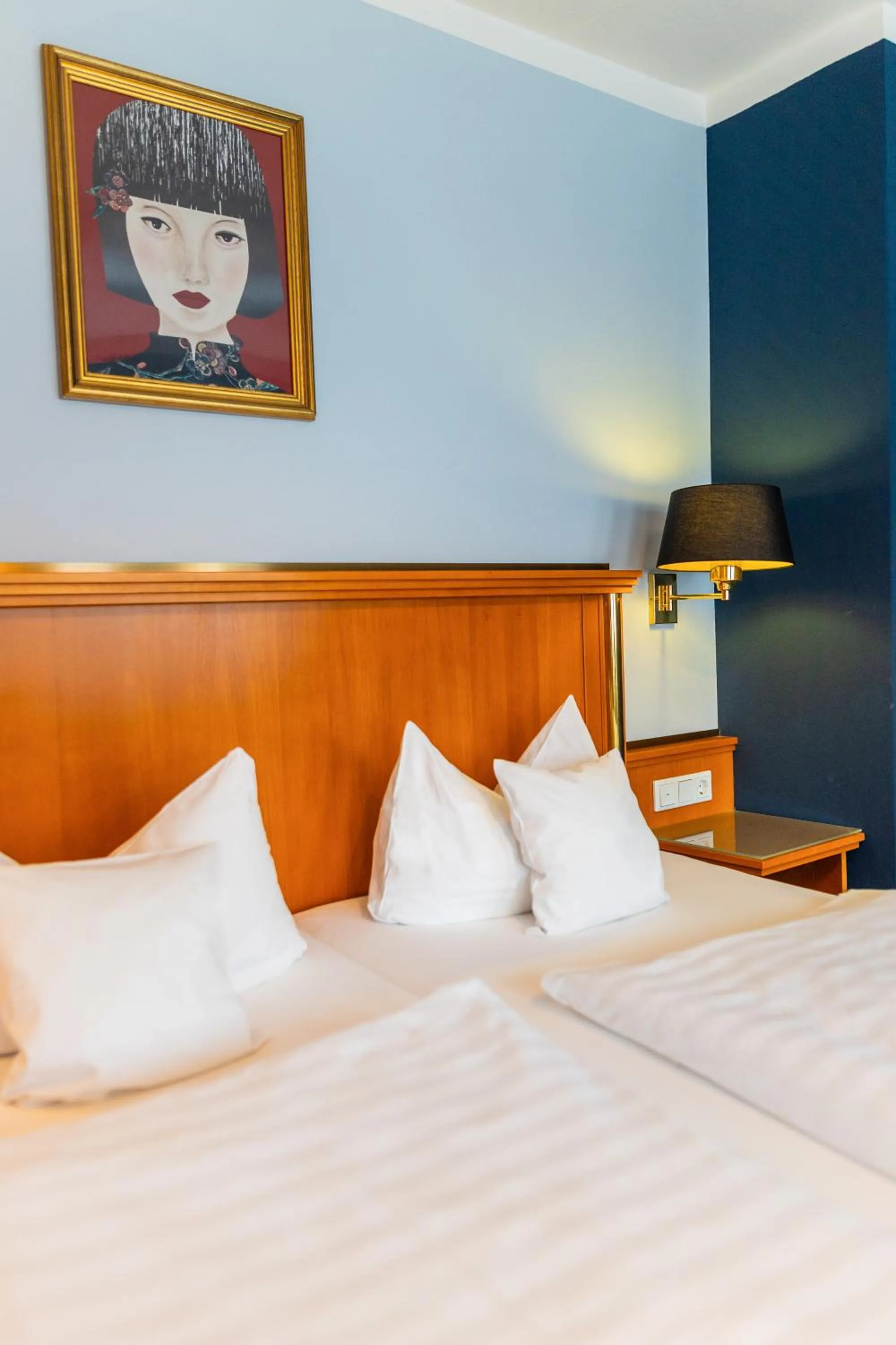 Bed in Boutique Hotel Bundschuh 3 Sterne Superior