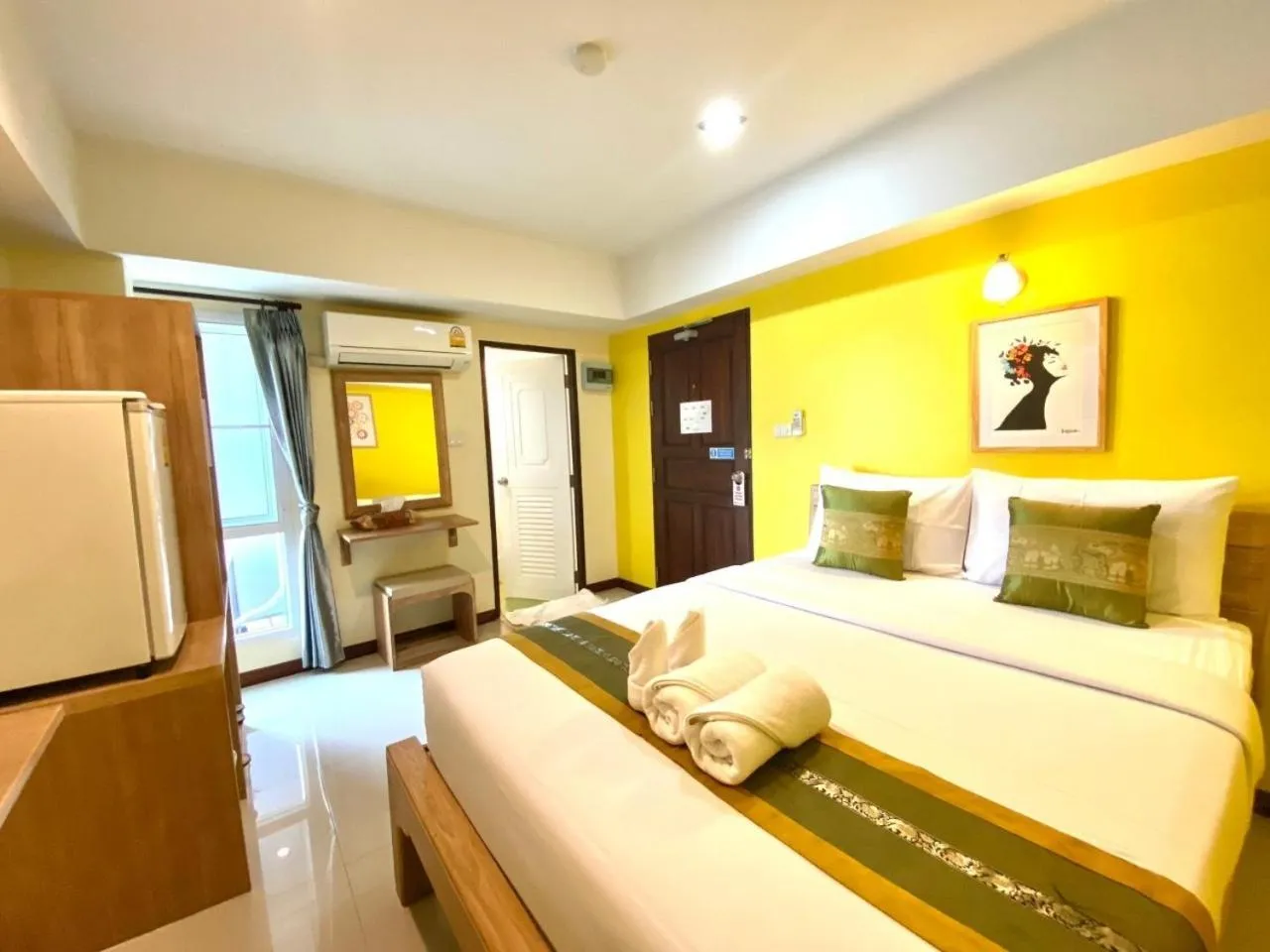 Bed in Chinda Boutique Hotel