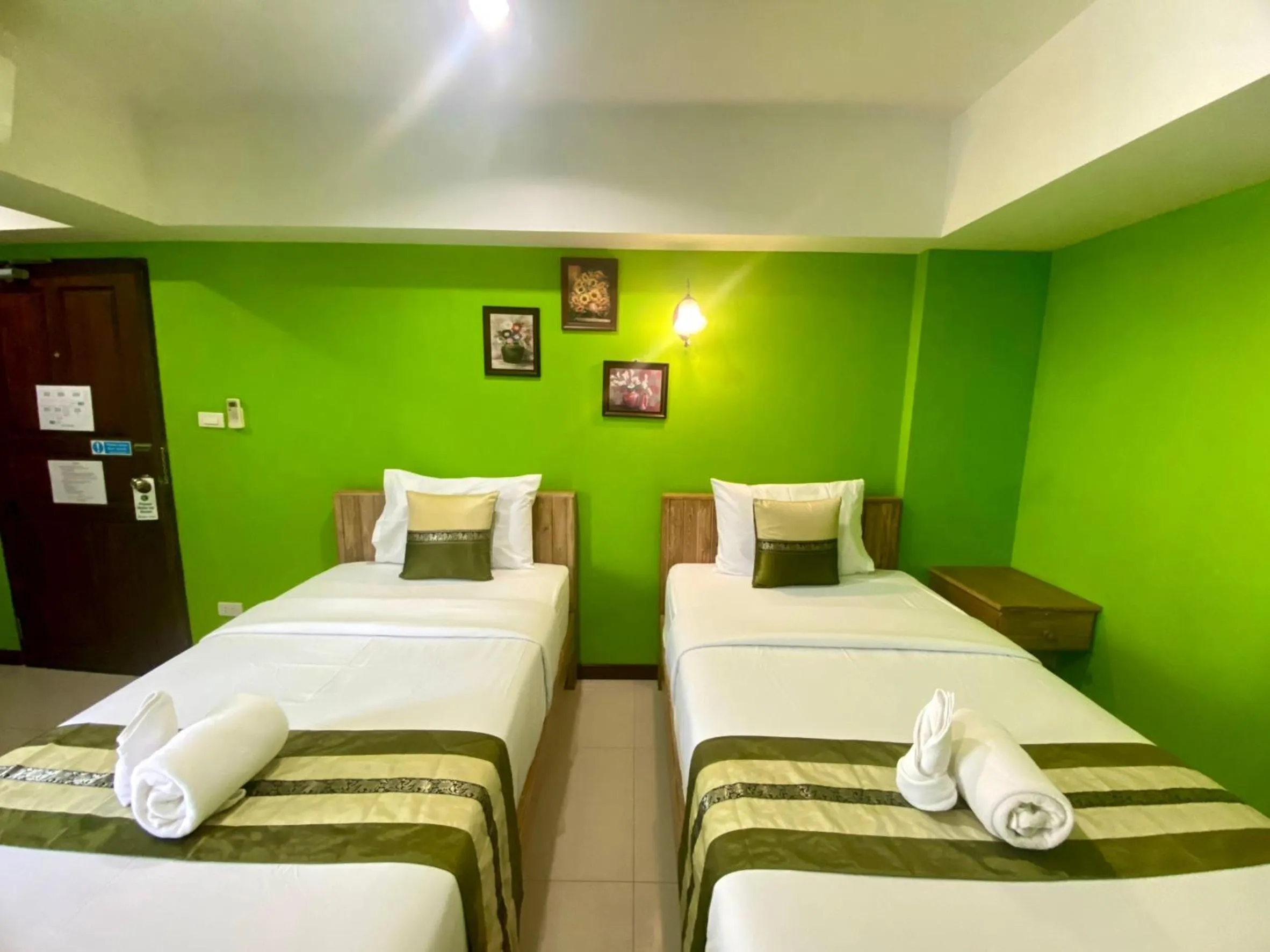 Bed in Chinda Boutique Hotel