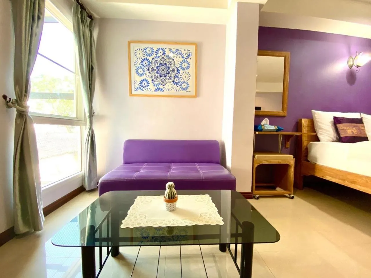 Seating area, Bed in Chinda Boutique Hotel