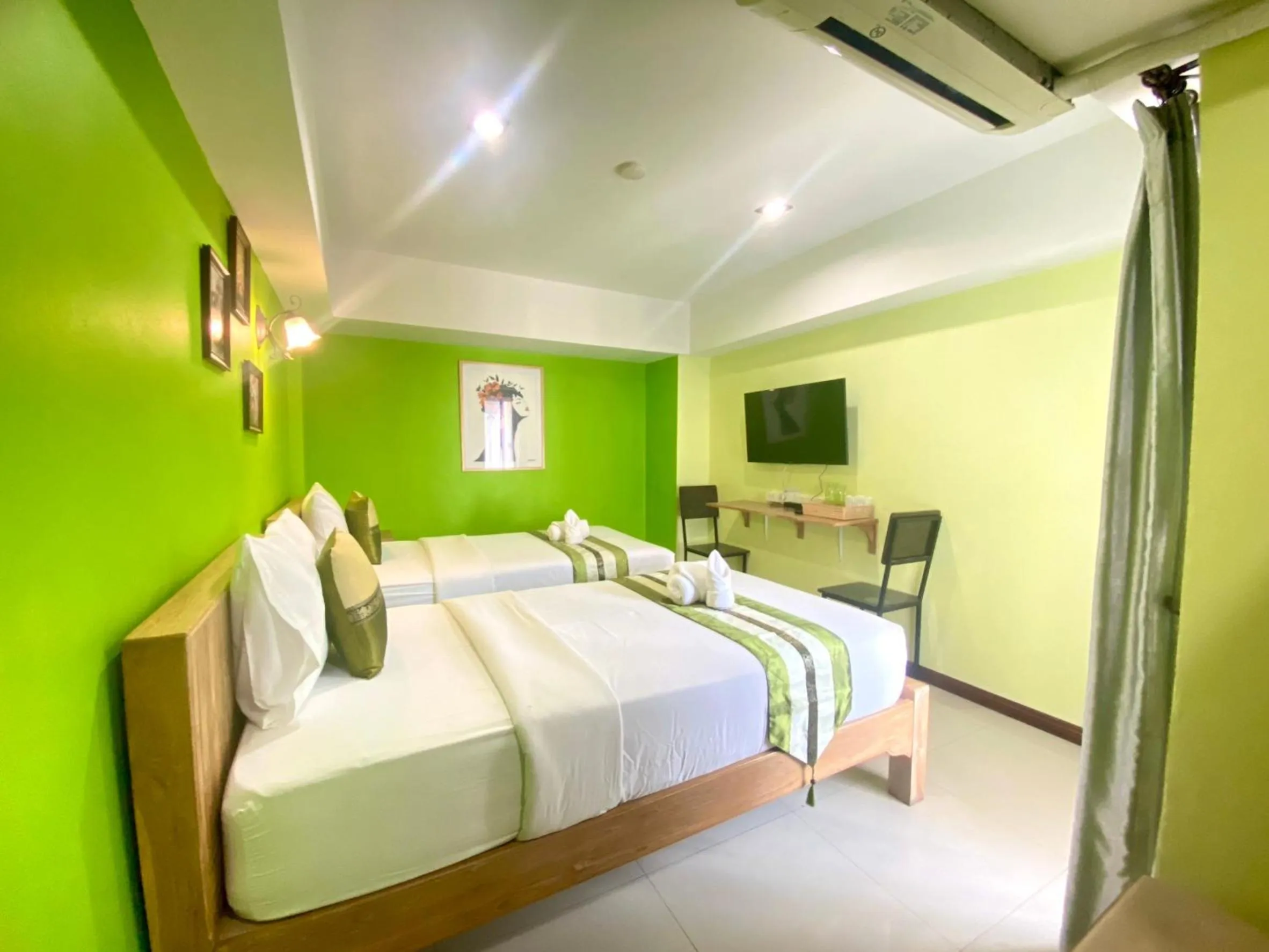 Bed in Chinda Boutique Hotel