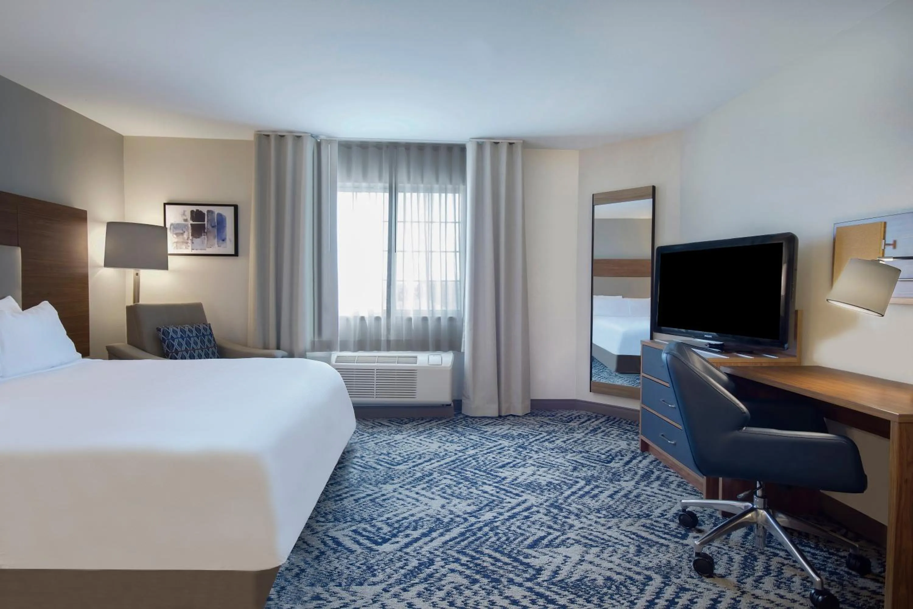 Bedroom, Bed in Candlewood Suites Buffalo Amherst by IHG