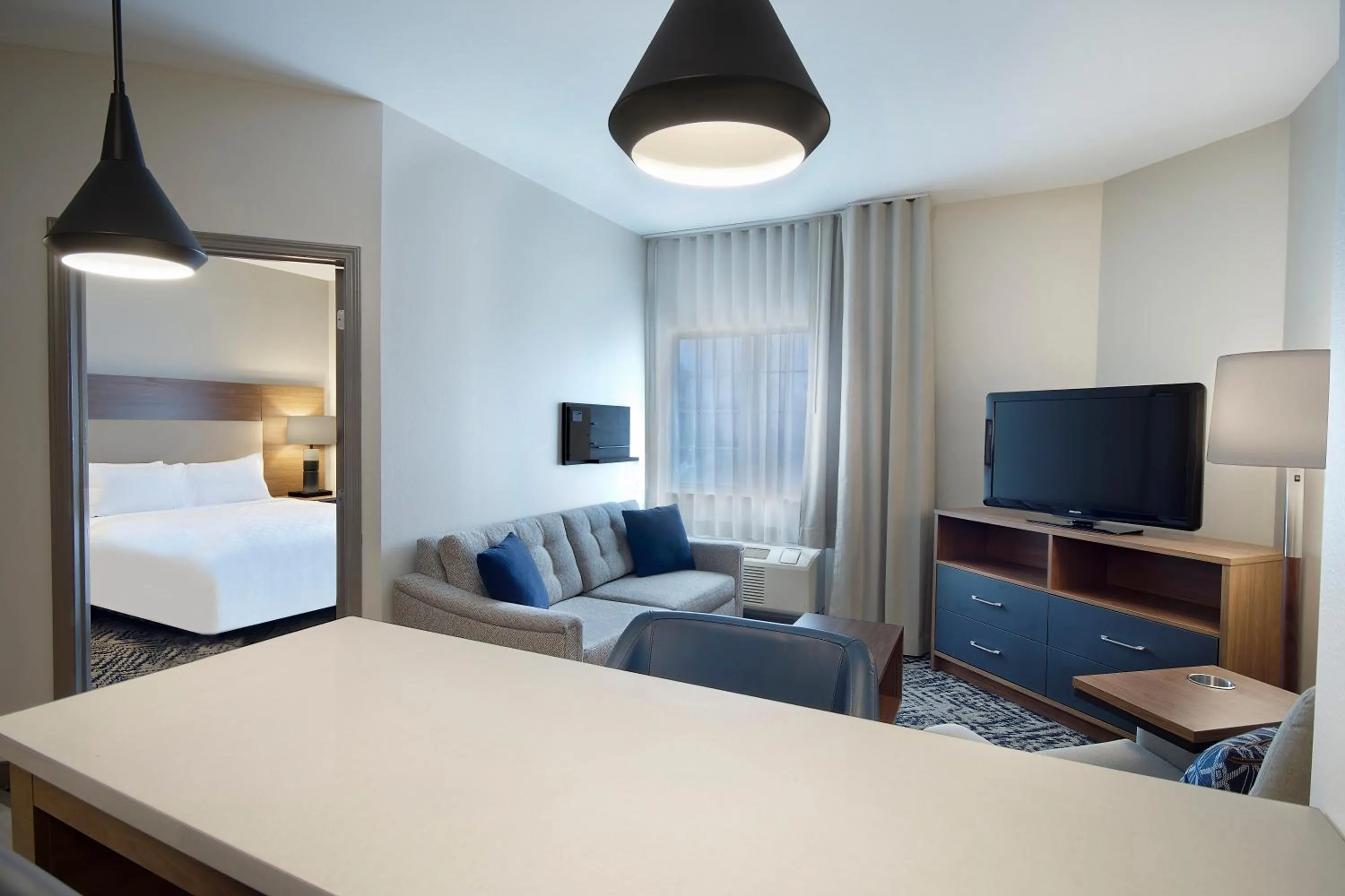 Living room, Bed in Candlewood Suites Buffalo Amherst by IHG