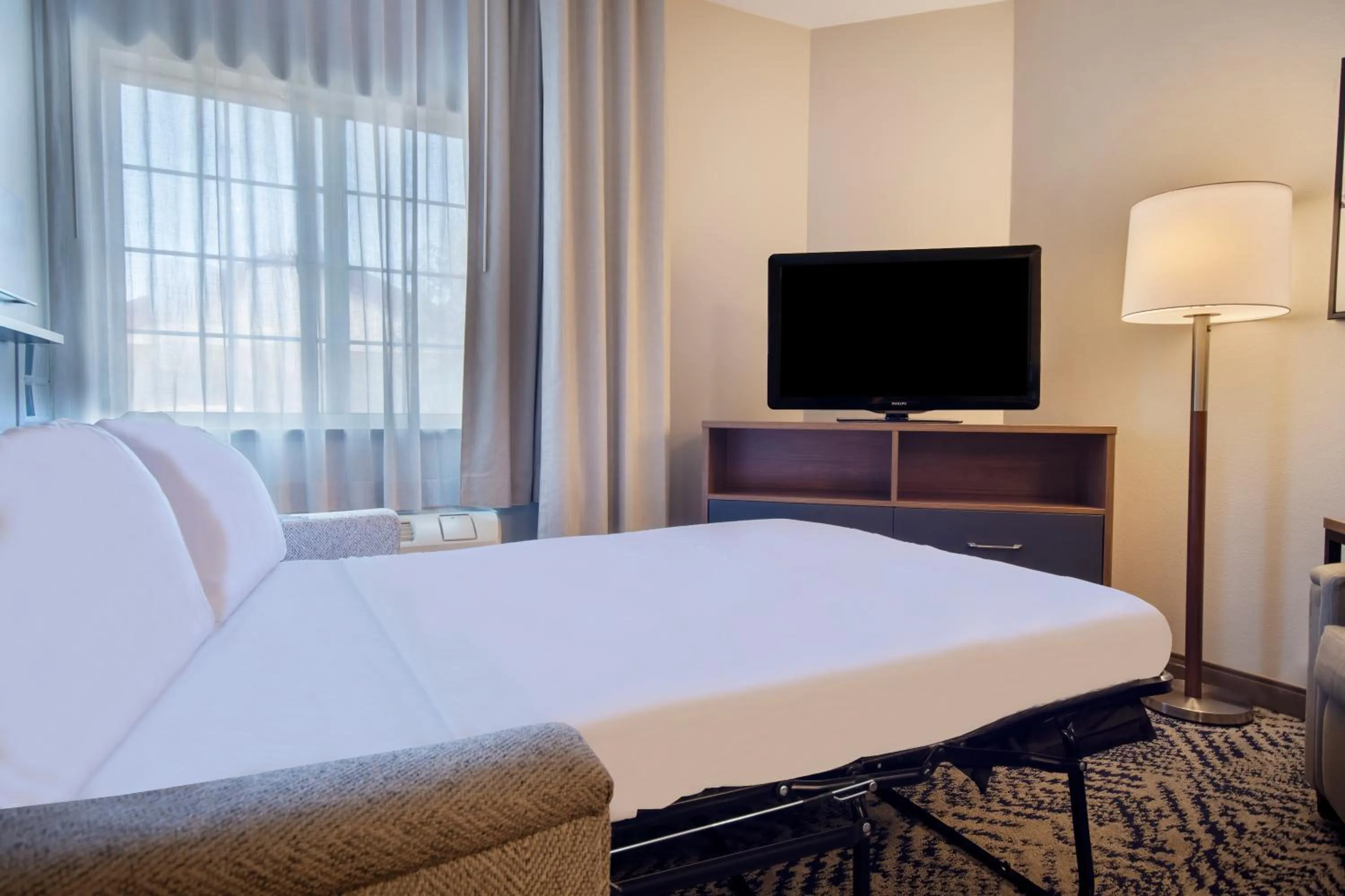 Bedroom, Bed in Candlewood Suites Buffalo Amherst by IHG