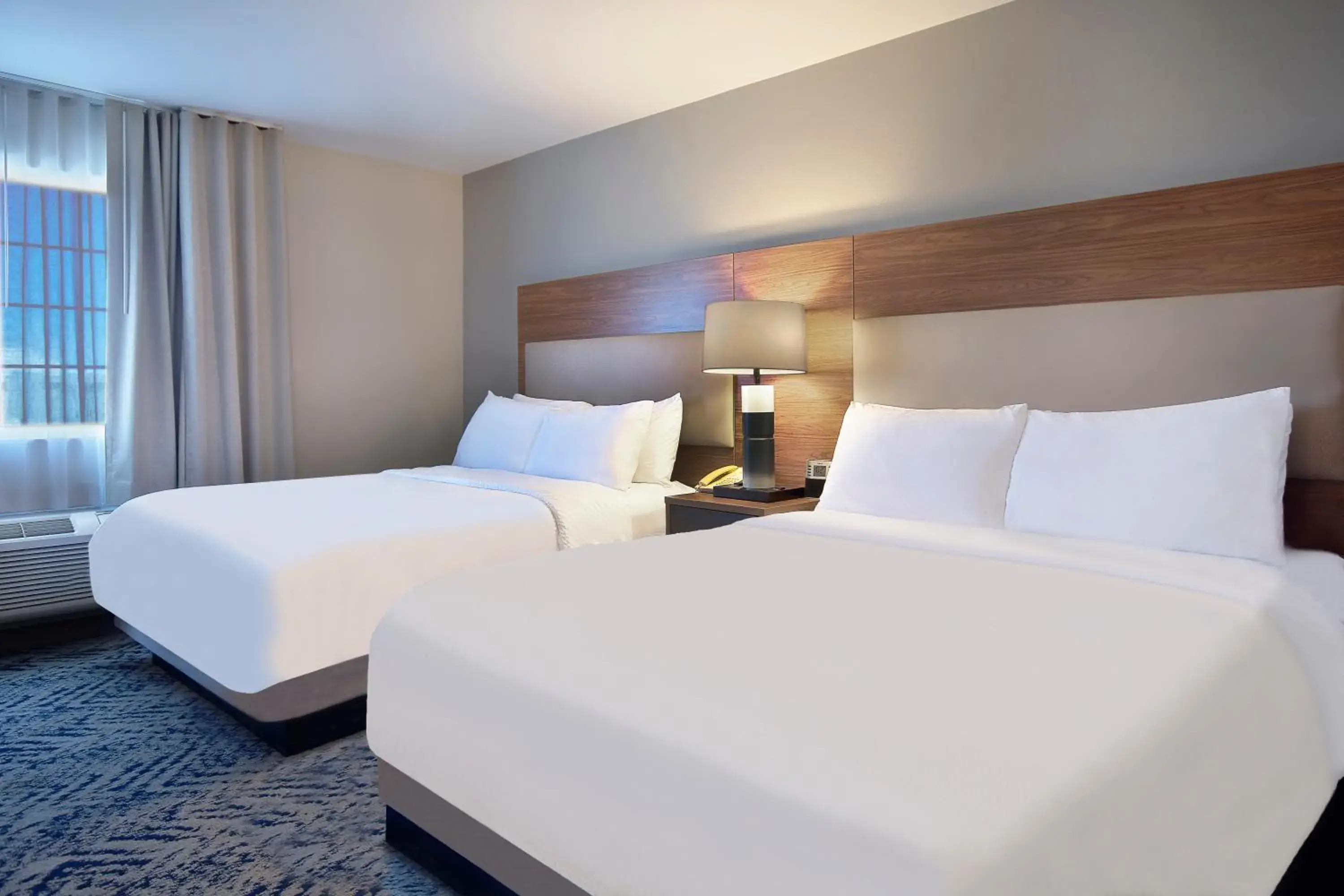 Bedroom, Bed in Candlewood Suites Buffalo Amherst by IHG Bedroom, Bed in Candlewood Suites Buffalo Amherst by IHG