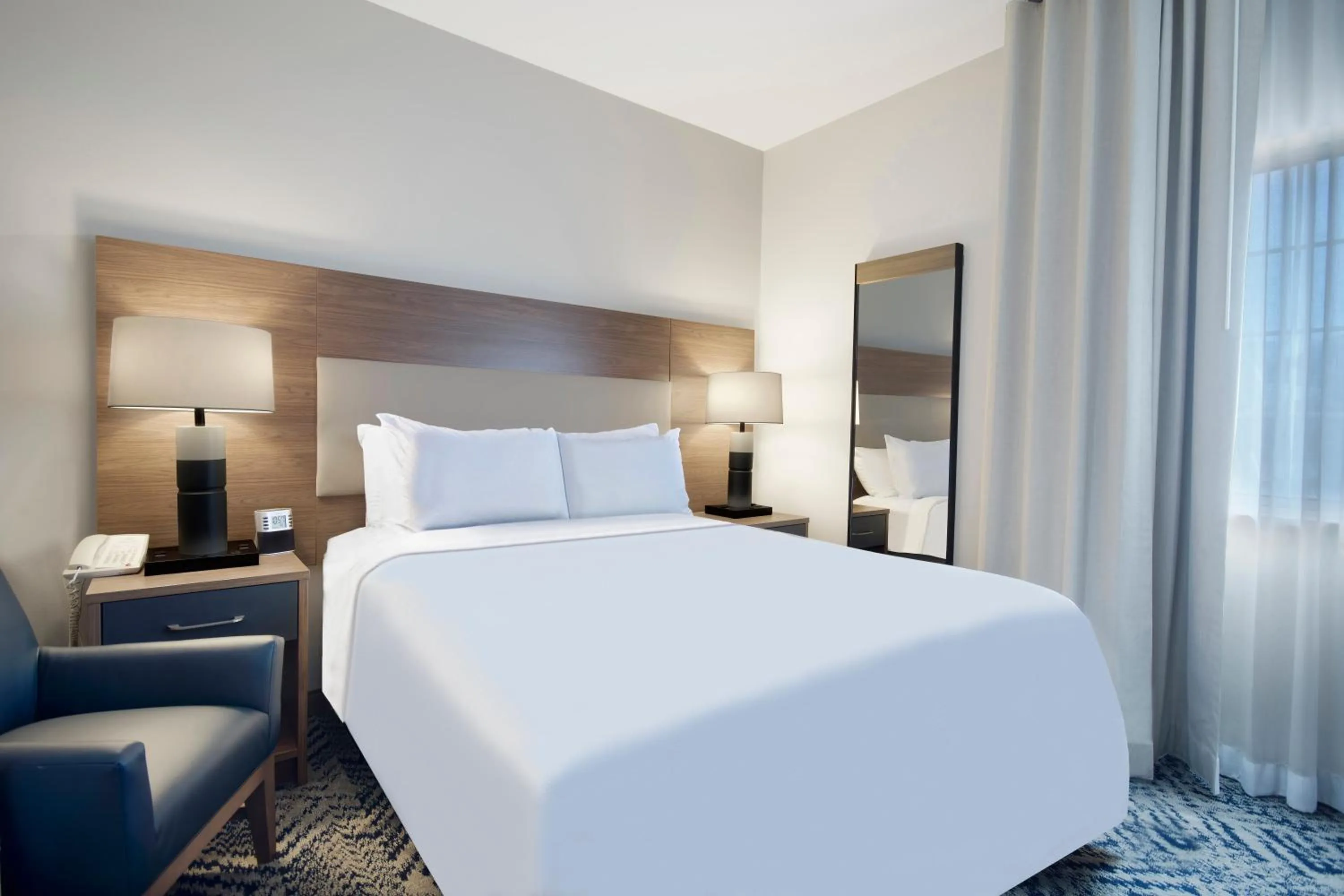 Bedroom, Bed in Candlewood Suites Buffalo Amherst by IHG