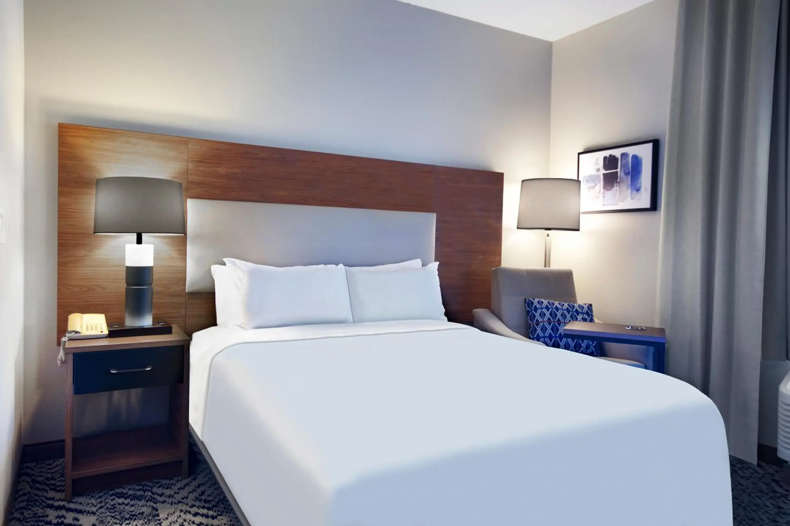 Bedroom, Bed in Candlewood Suites Buffalo Amherst by IHG Bedroom, Bed in Candlewood Suites Buffalo Amherst by IHG