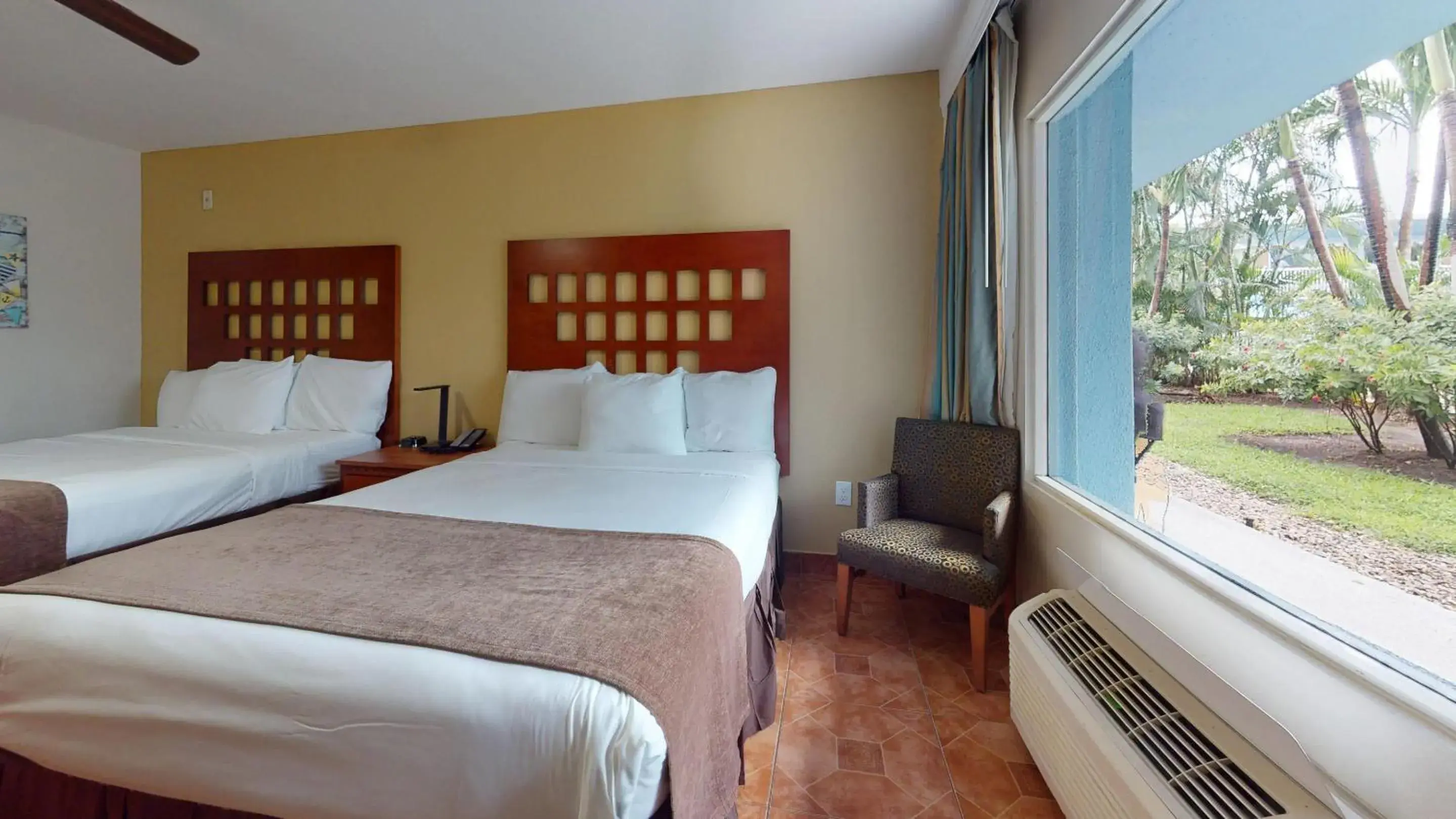 Deluxe Queen Room with Two Queen Beds - Non-Smoking in Rodeway Inn & Suites Fort Lauderdale Airport & Cruise Port Deluxe Queen Room with Two Queen Beds - Non-Smoking in Rodeway Inn & Suites Fort Lauderdale Airport & Cruise Port