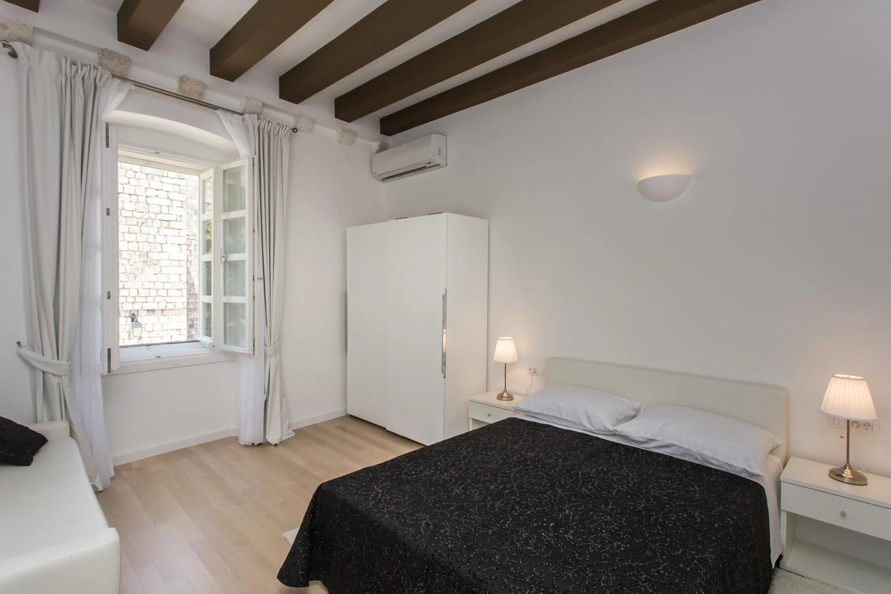 Bedroom in Klarisa Palace Rooms