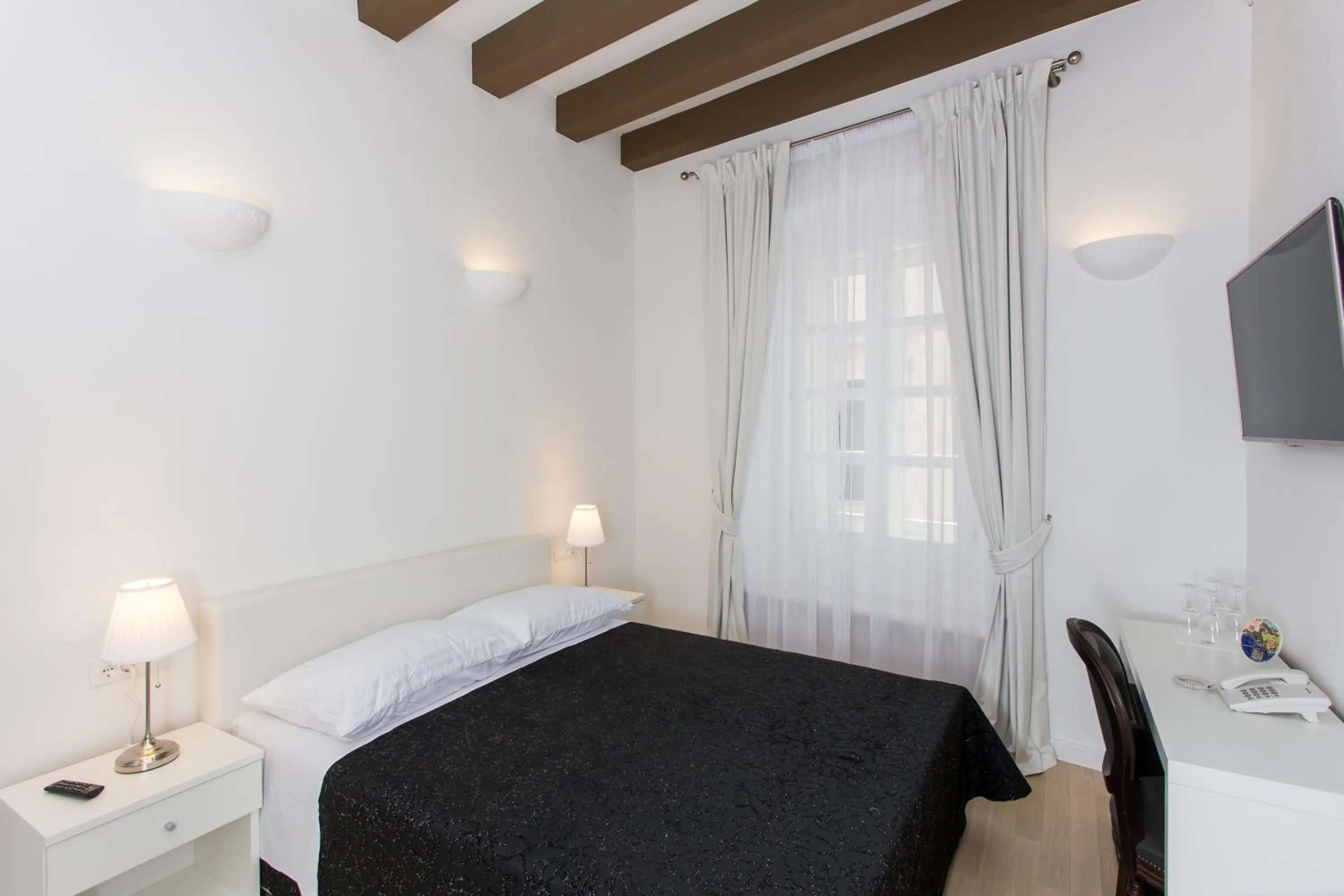 Bedroom in Klarisa Palace Rooms