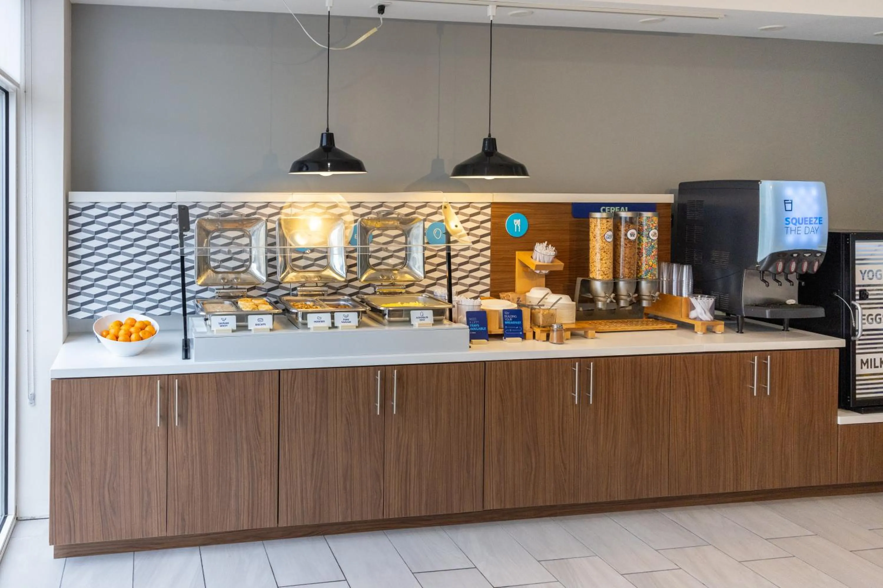 Buffet breakfast in Holiday Inn Express Hotel & Suites Wichita Airport by IHG