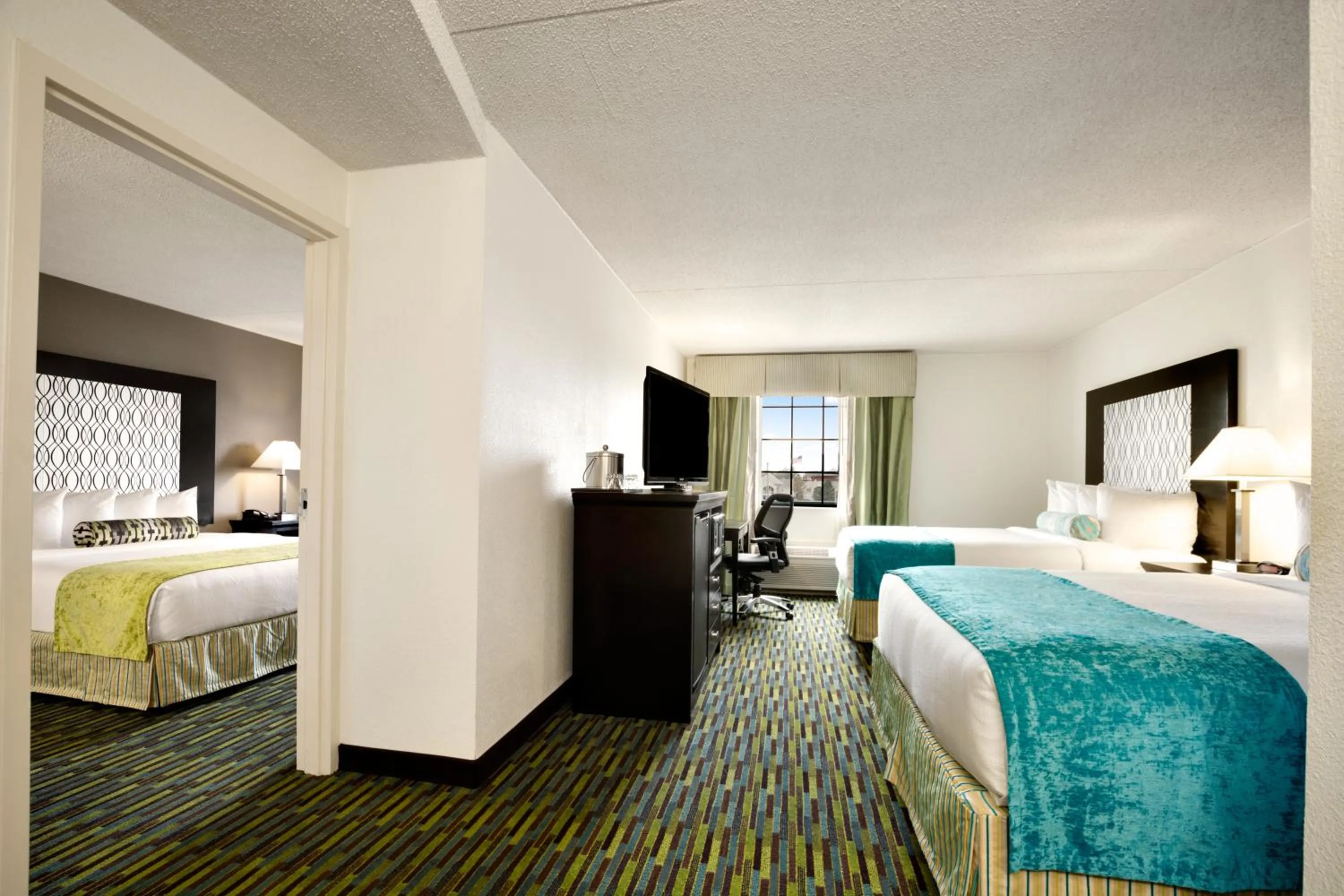 Photo of the whole room, Bed in Wyndham Garden Wichita Downtown