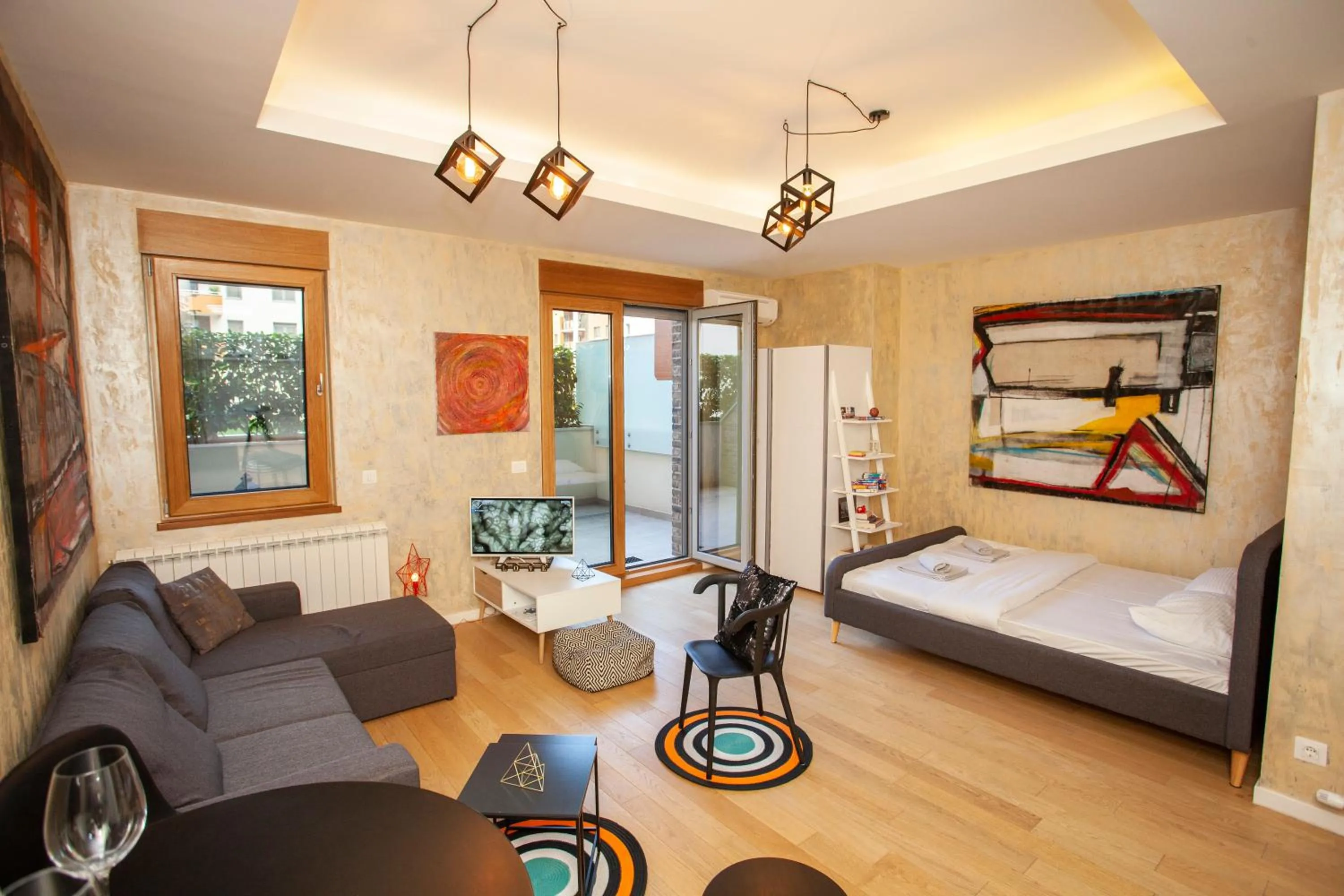 Living room, Bed in Gentleman Dog Apartment