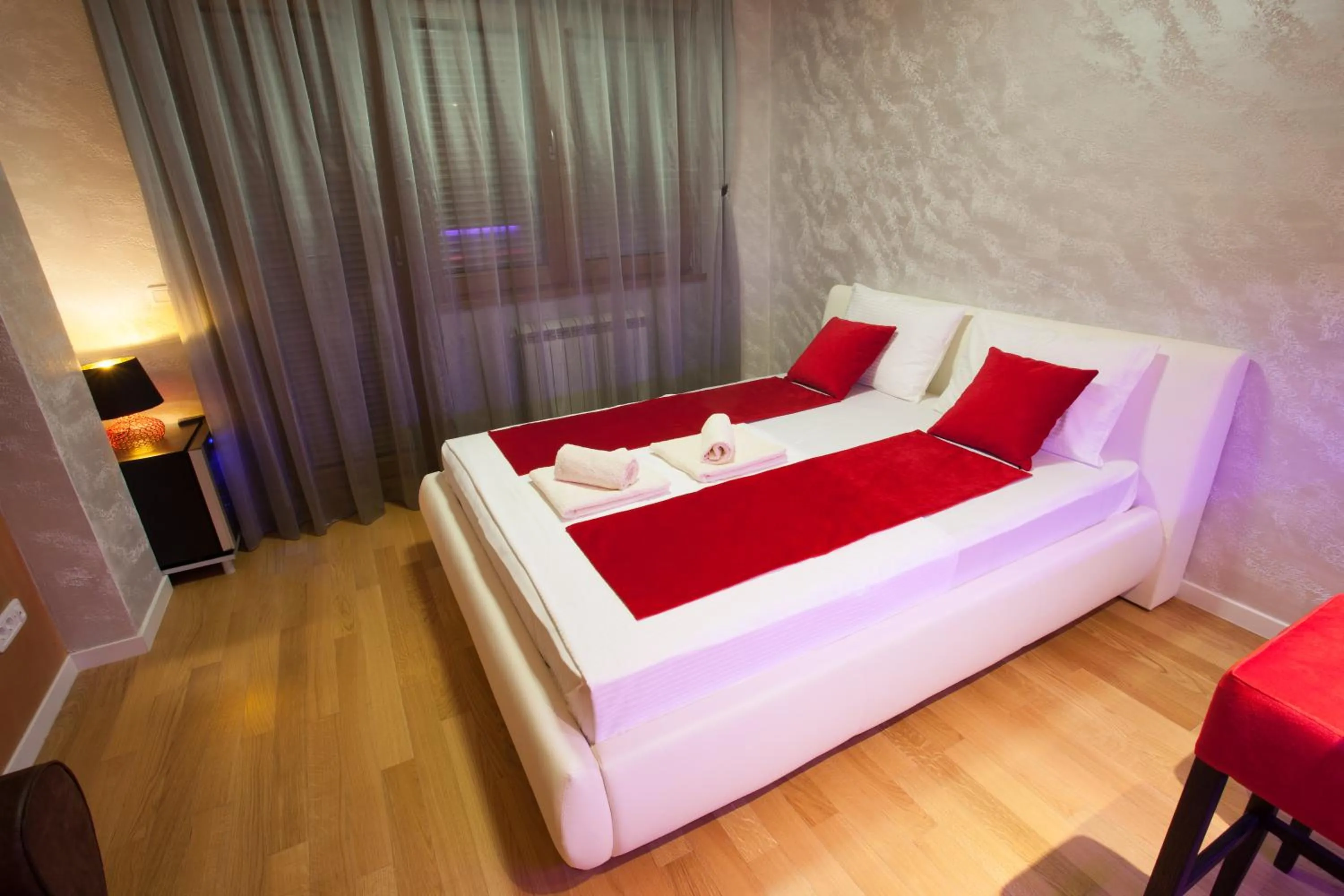 Bedroom, Bed in Gentleman Dog Apartment