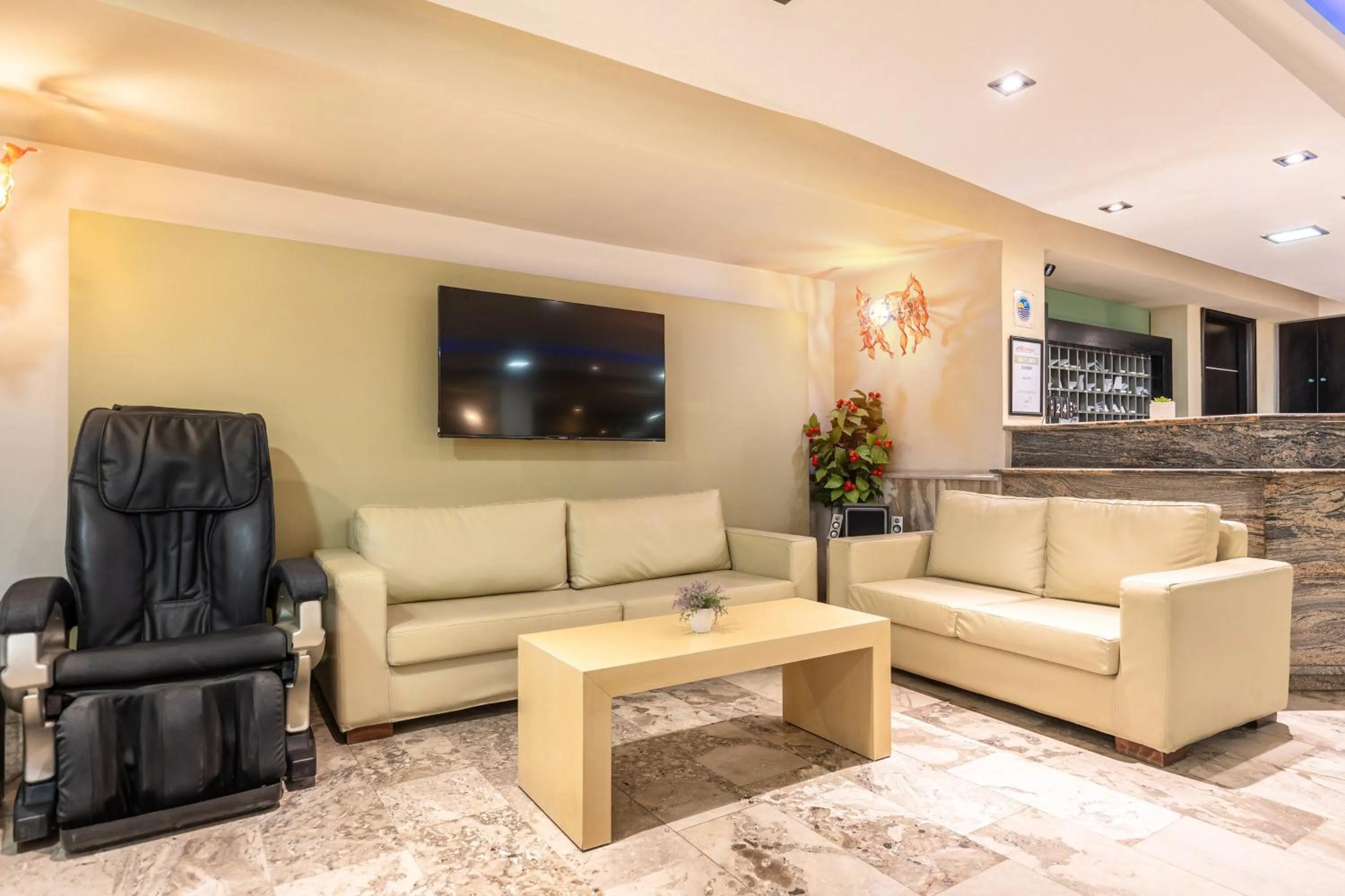 Communal lounge/ TV room in Esperia Hotel