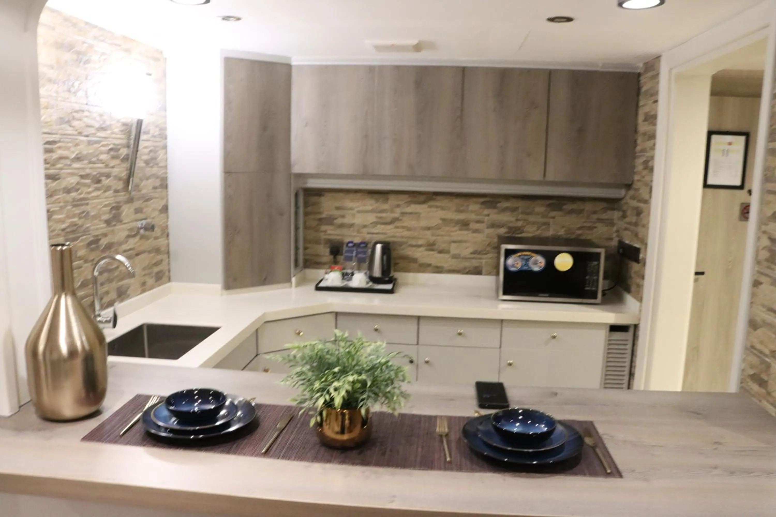 Kitchen or kitchenette in Continent Al Waha Hotel Riyad