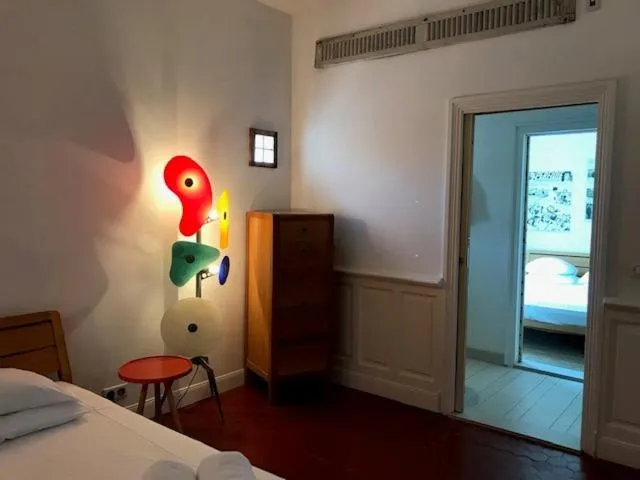 Bed in Hôtel de la Pinède